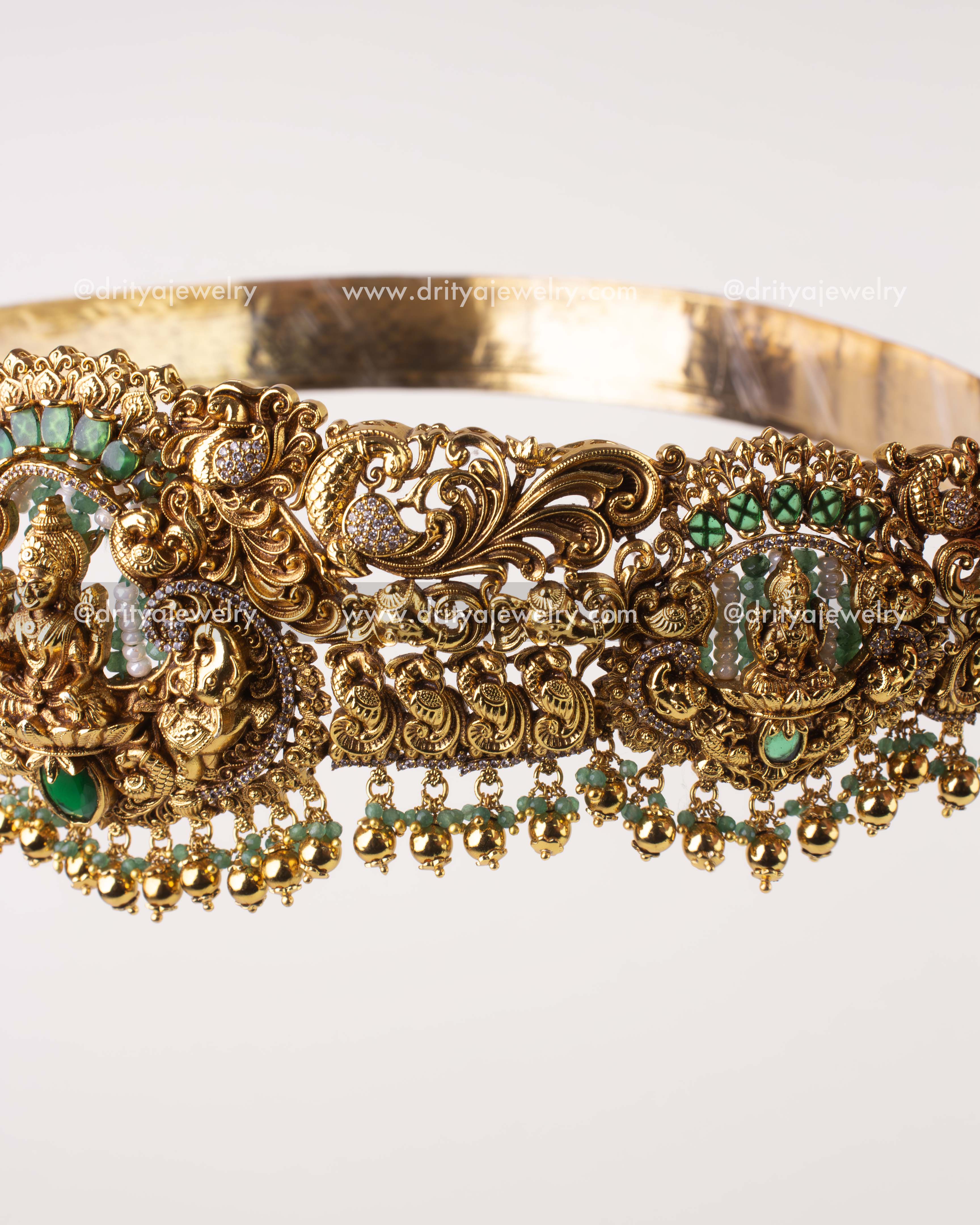 1244-WB temple waist belt side angle showing intricate peacock and idol detailing
