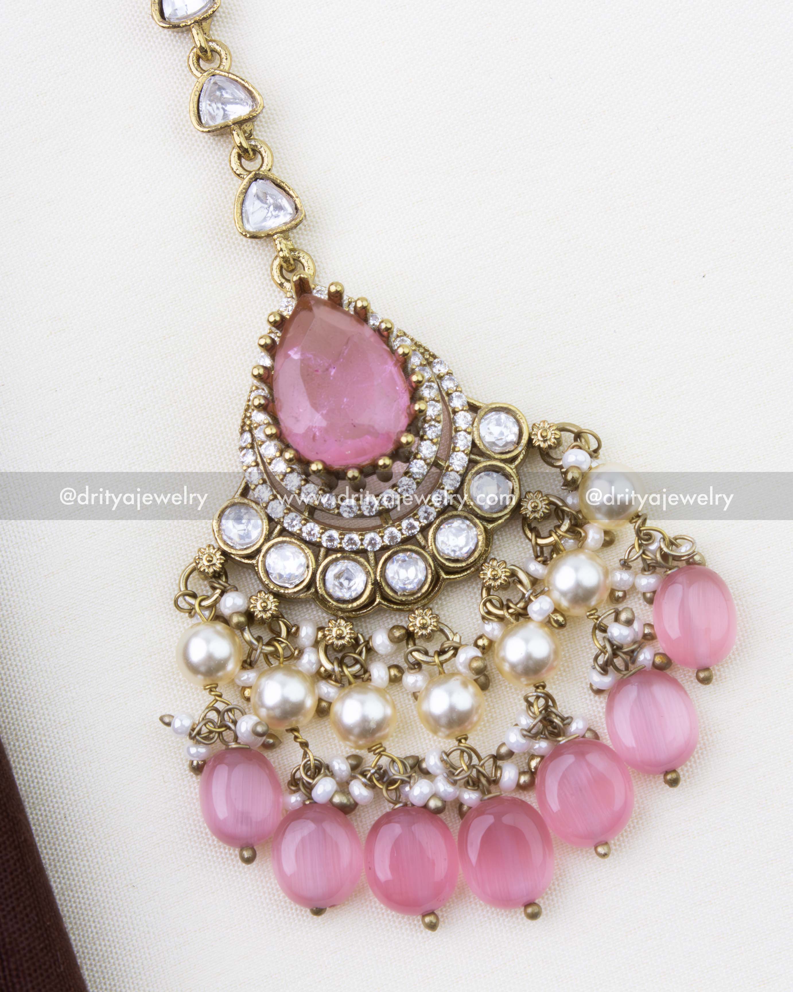1285-BP close-up of pink polki kundan maang tikka pendant with pearls and blush bead hangings