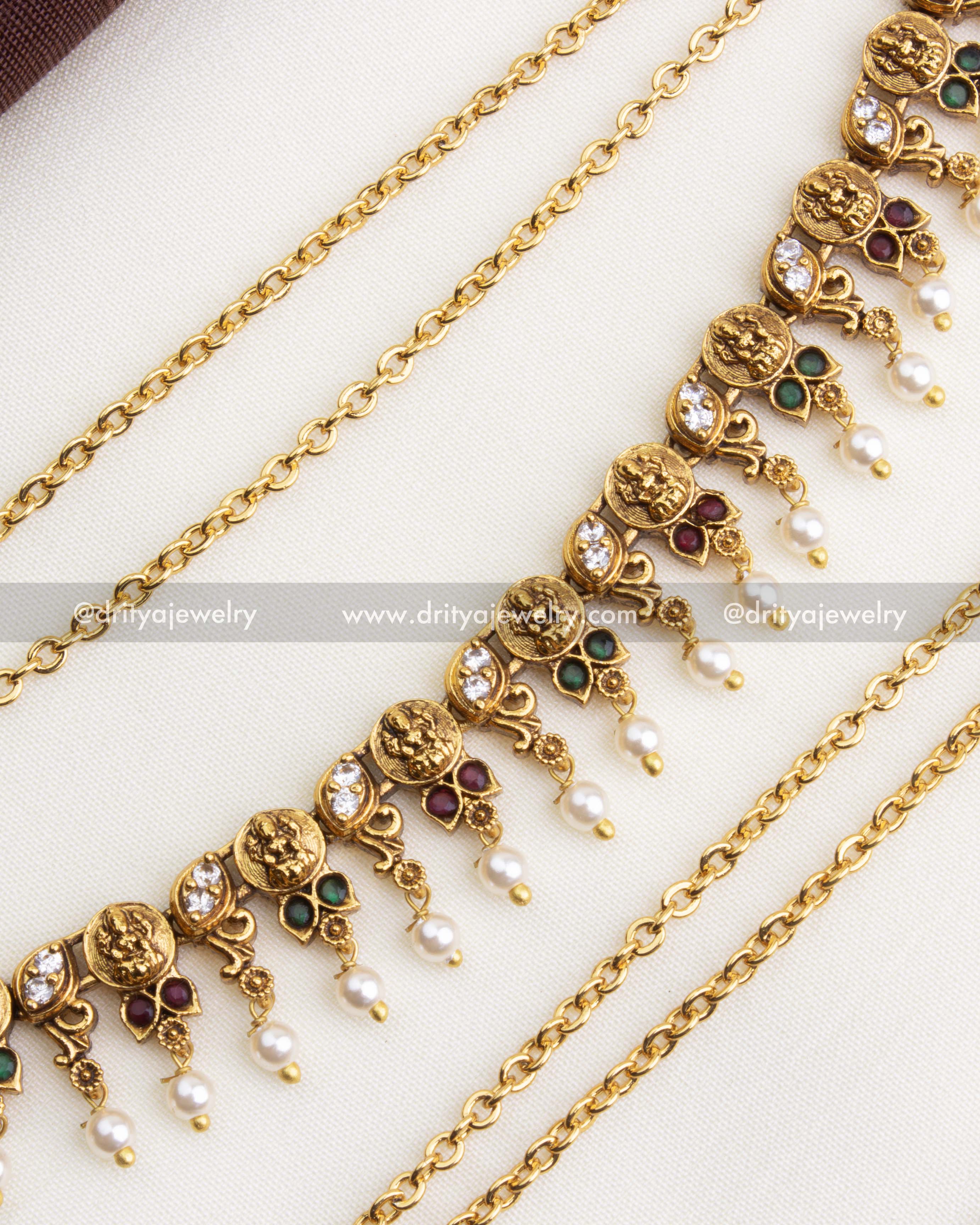 SKU 1198 close-up of god idol coin motifs and pearl drops on champaswaralu anklets
