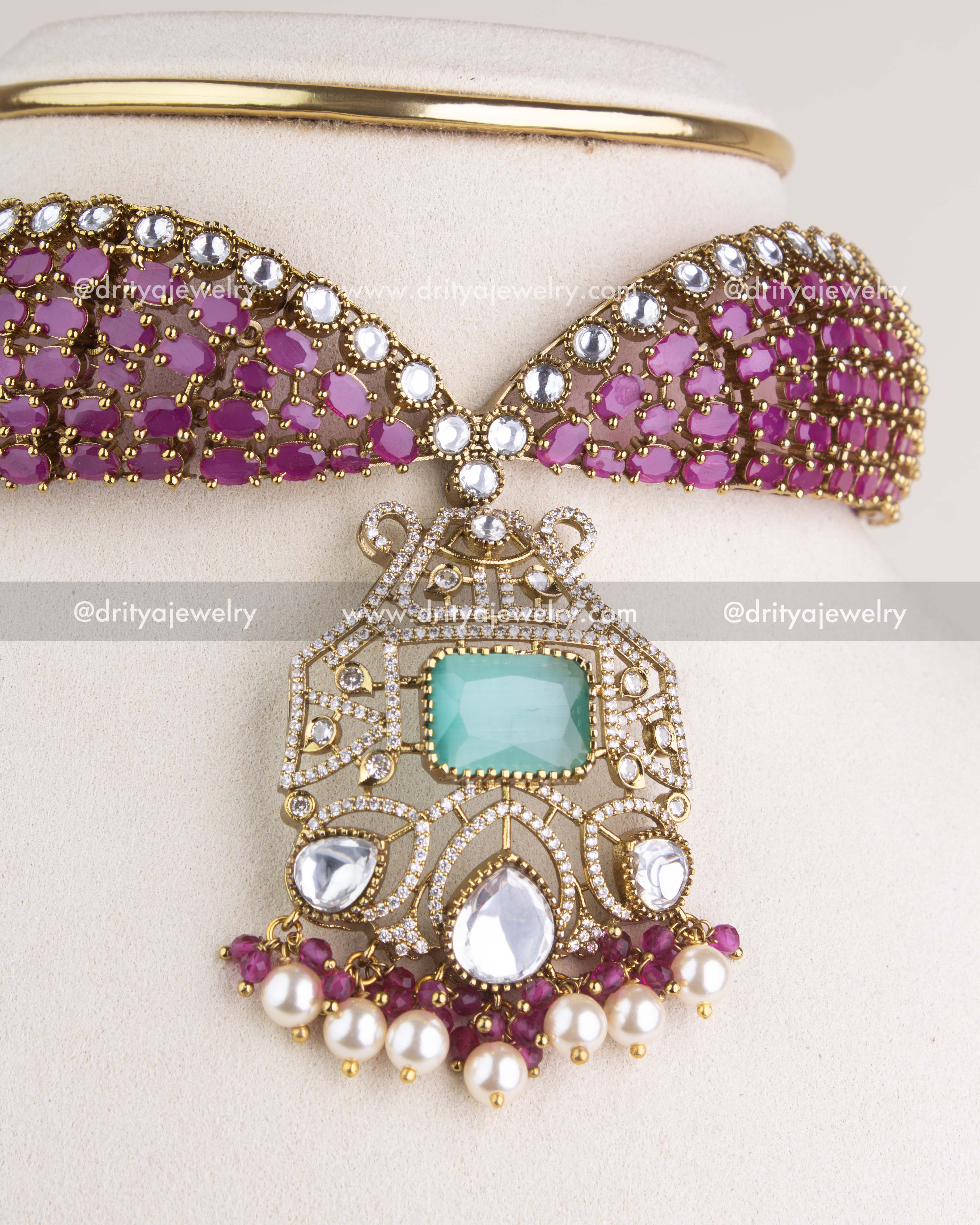 SKU 1205 Necklace Set detailed view of central pendant with mint green stone, kundan work and pearl bead fringe.