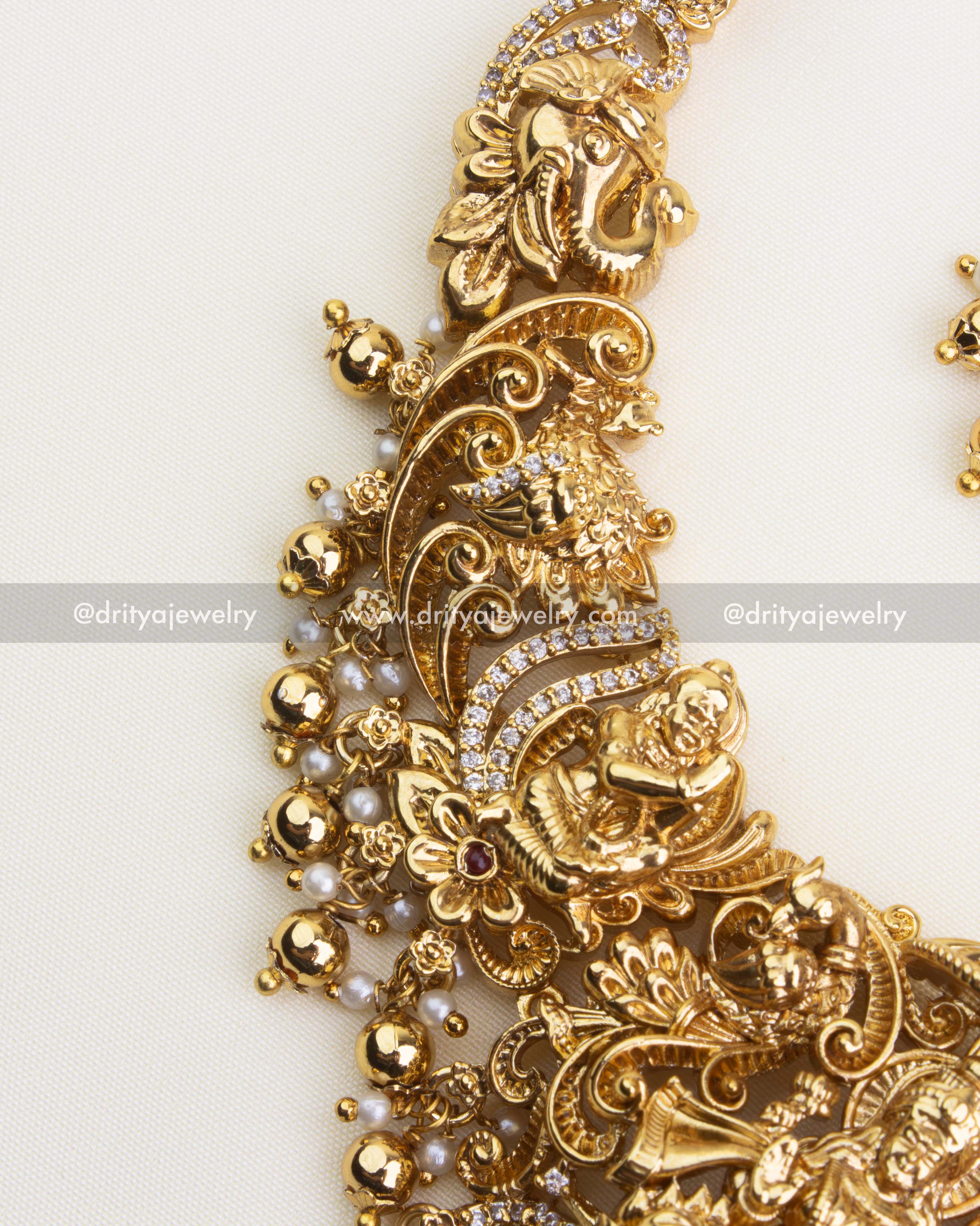 SKU 1121 Necklace Set - Side close-up of nakshi temple necklace with deity and CZ stone detailing