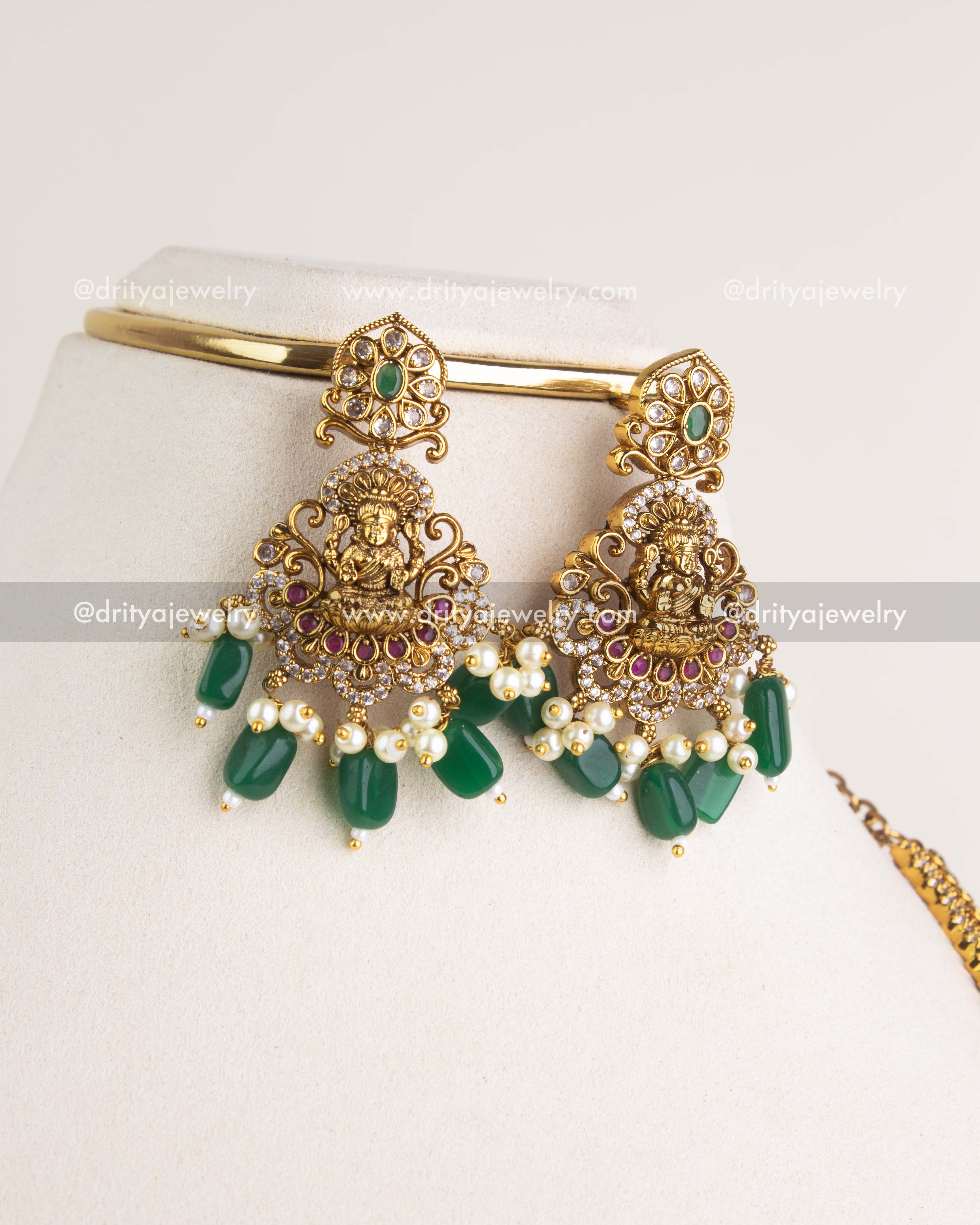 SKU 1161 Necklace Set close-up of matching temple earrings with green bead and pearl drops
