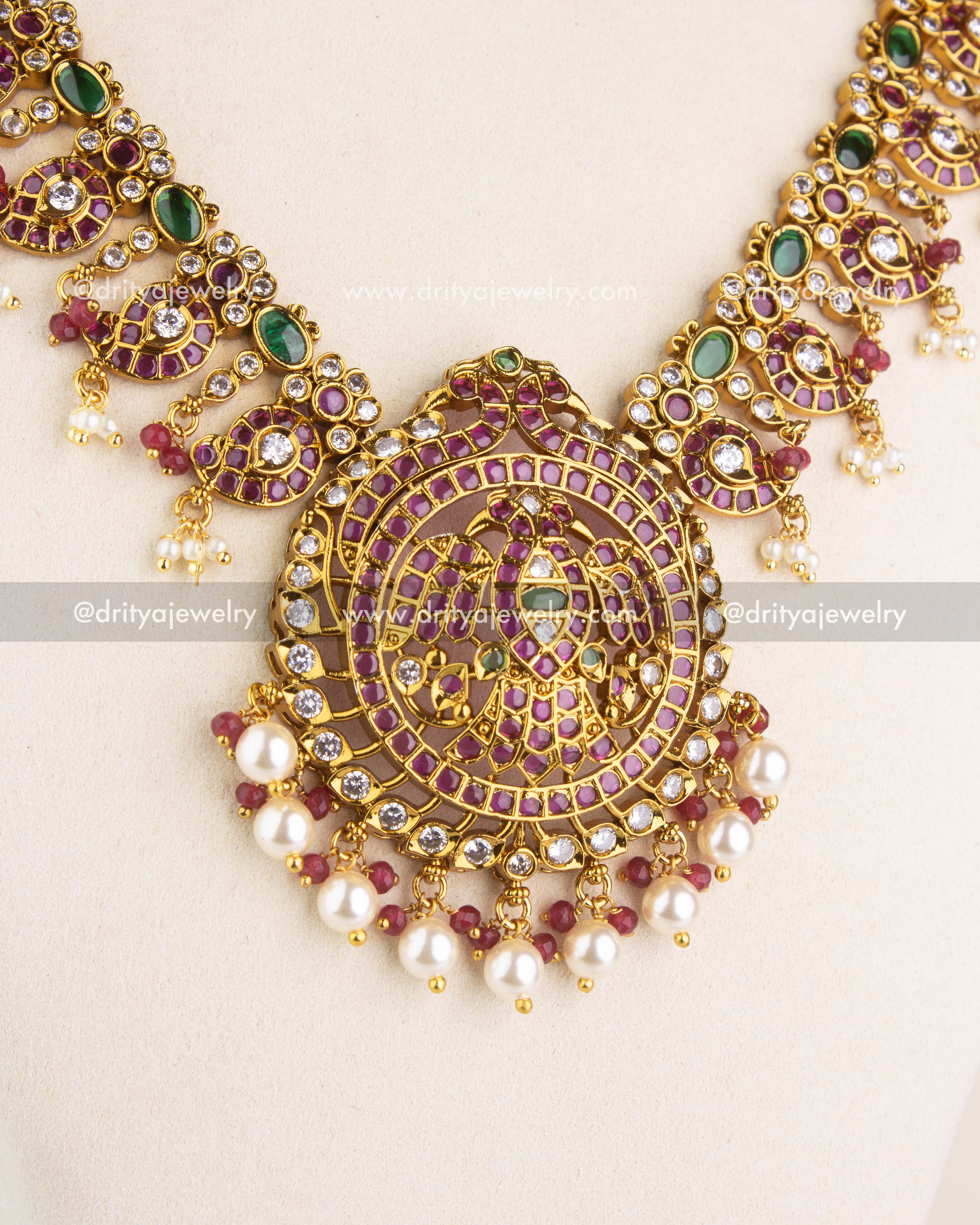 1201 - Necklace Set - Close-up of central idol-style pendant with pearl drops