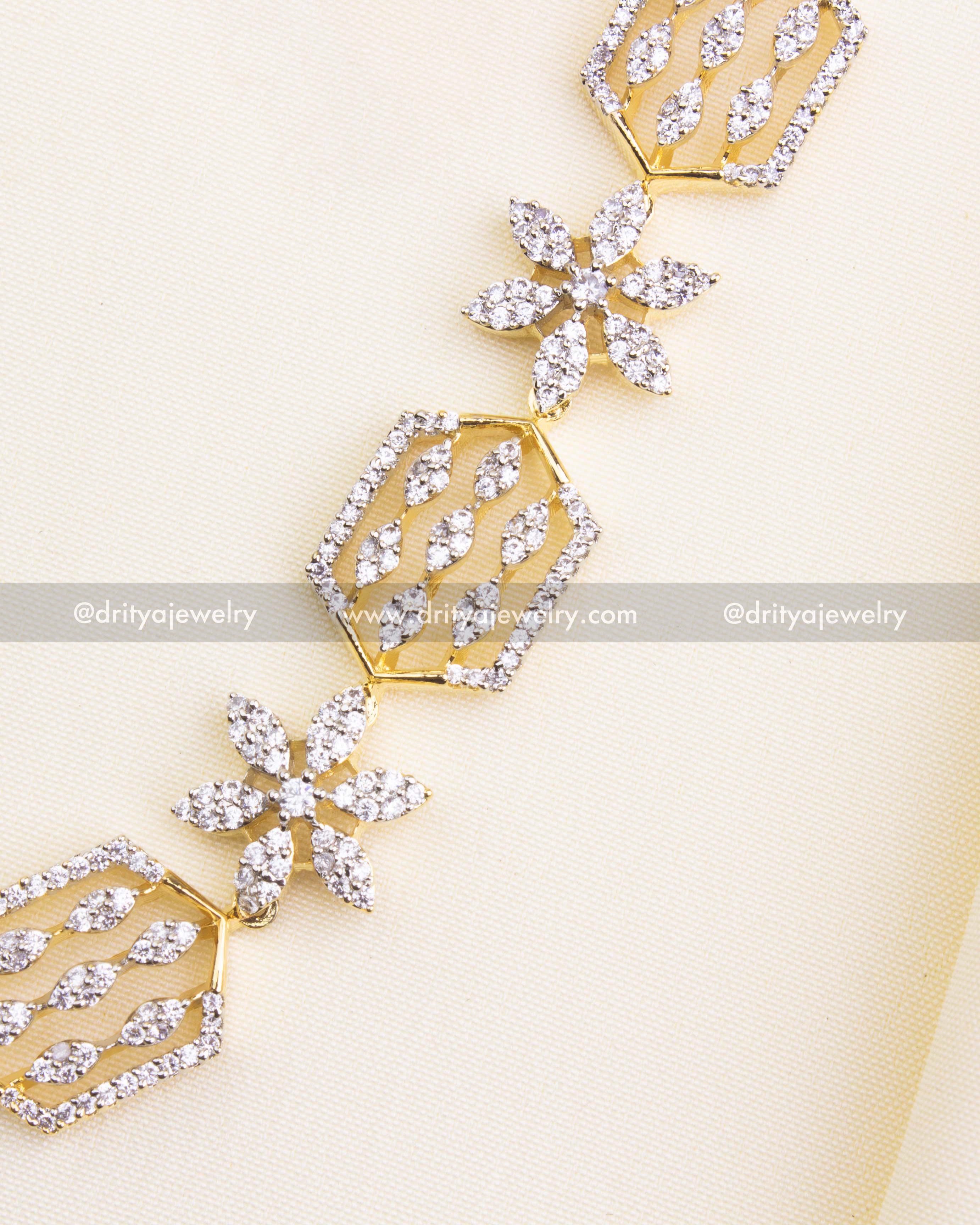 SKU 1183 close-up of floral and hexagon CZ detailing on necklace set