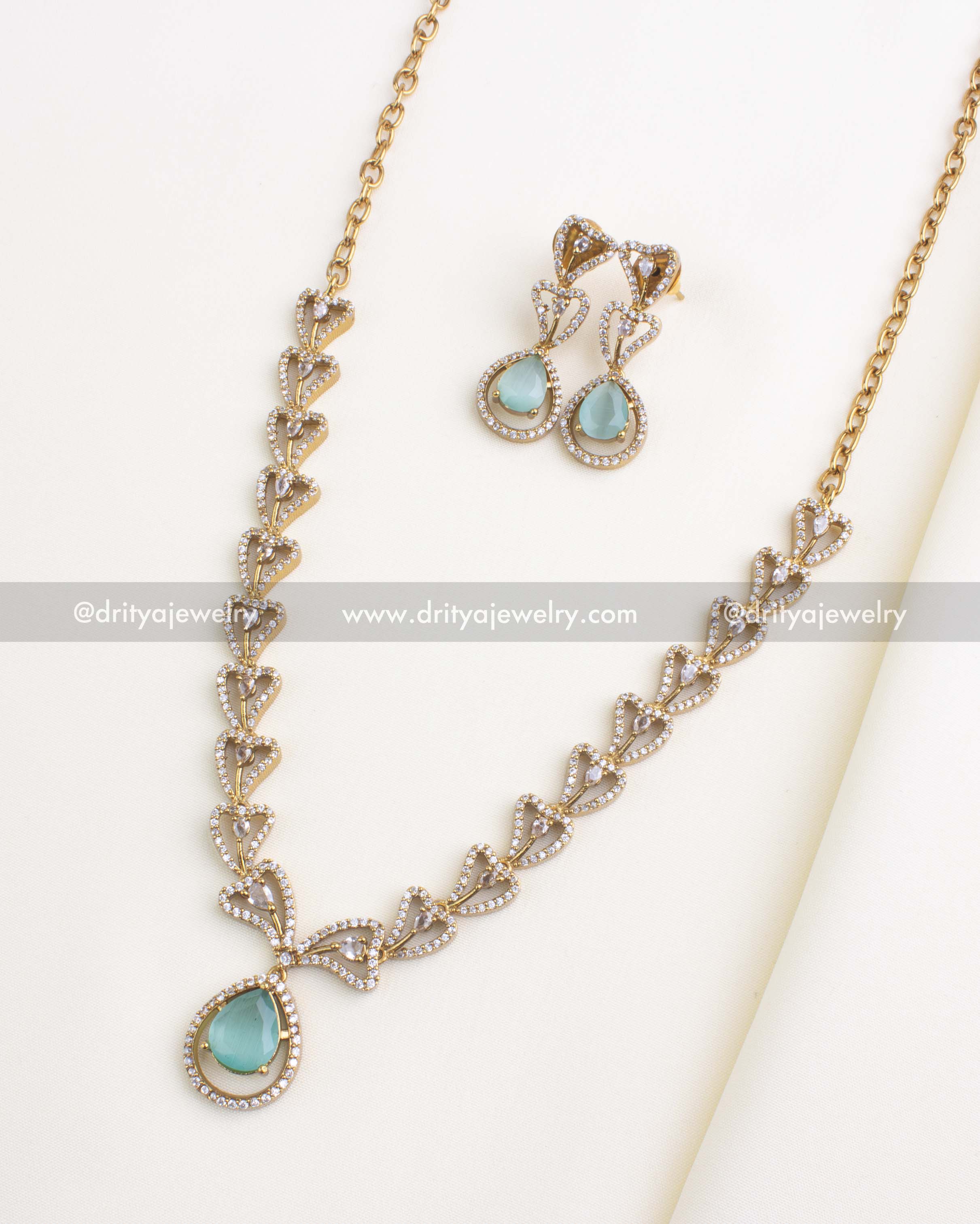 1152-MG Necklace Set - full necklace and earrings set laid flat showing antique short design