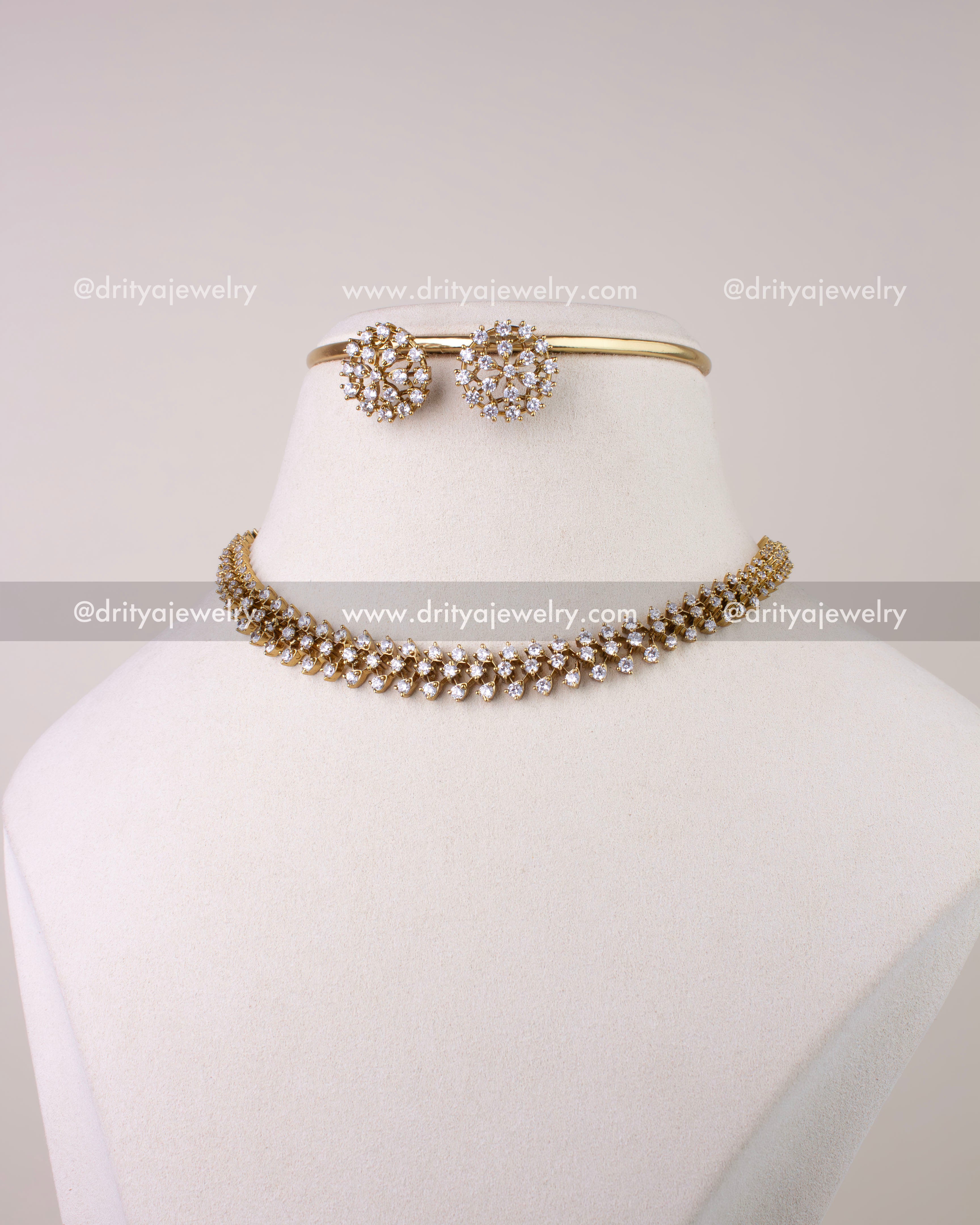 SKU 1304 - Necklace set styled as short necklace with studs on display bust