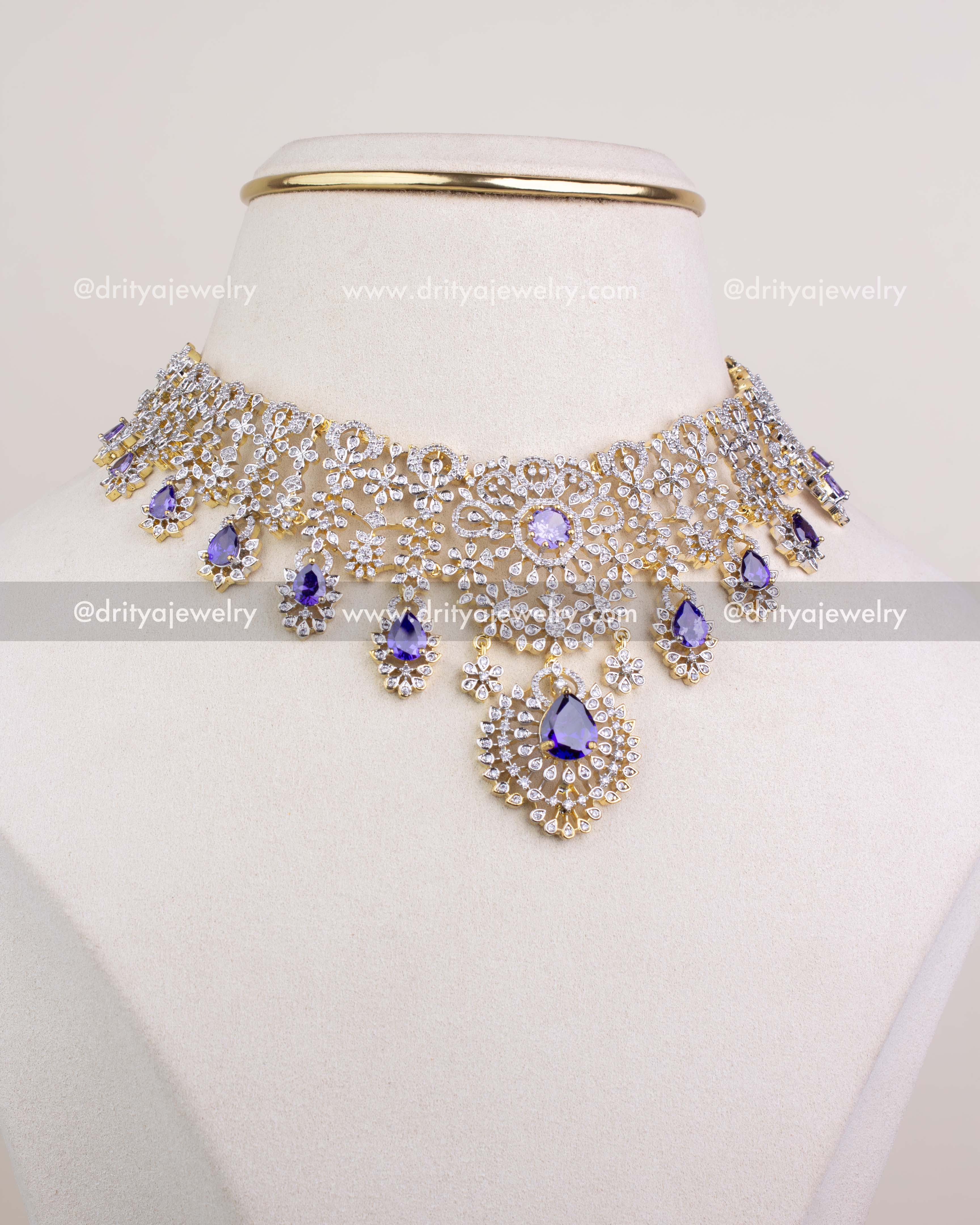 Front close view of purple CZ stone short necklace showing intricate floral detailing