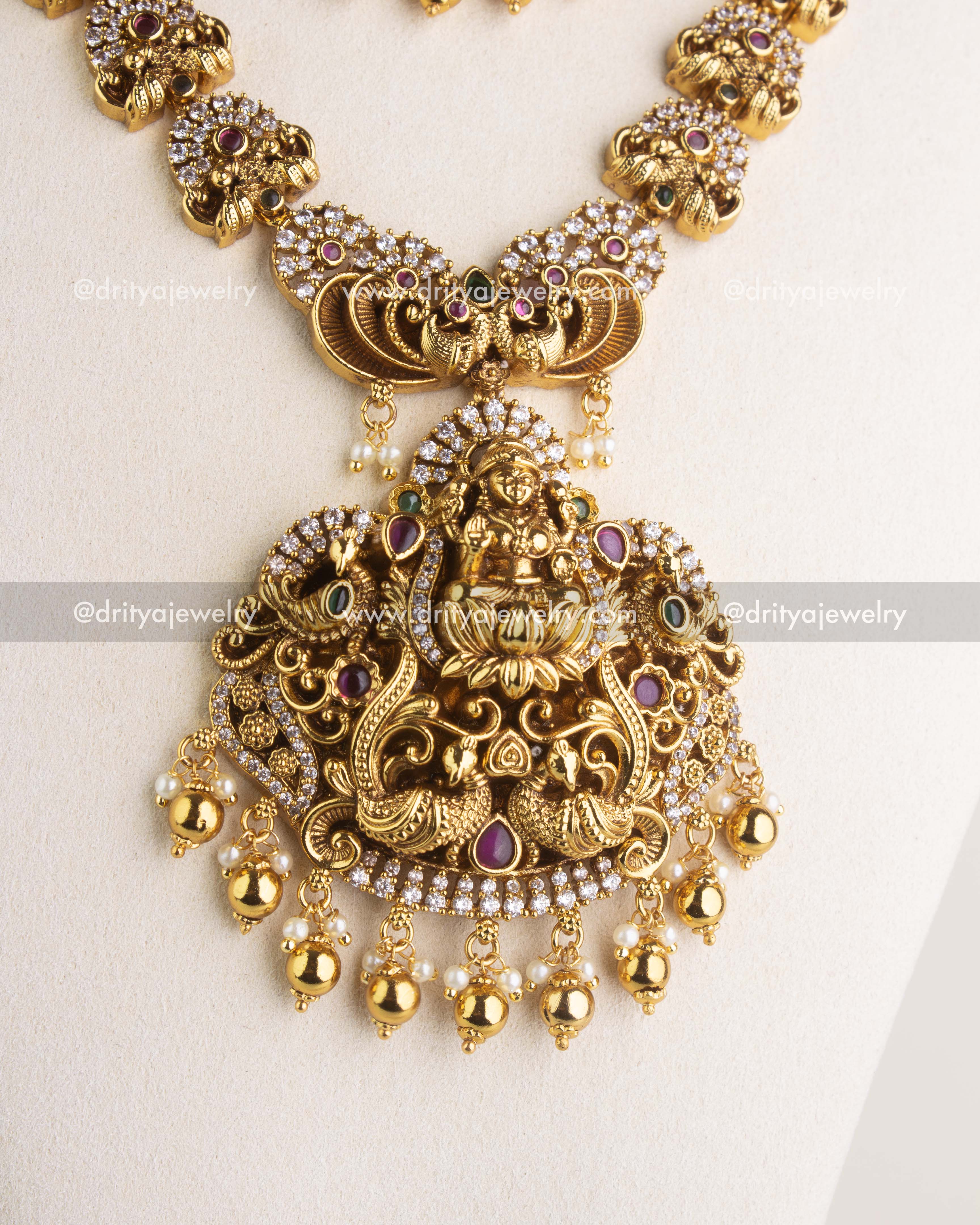 SKU 1163 Necklace Set close-up of large god idol pendant with nakshi detailing and bead drops
