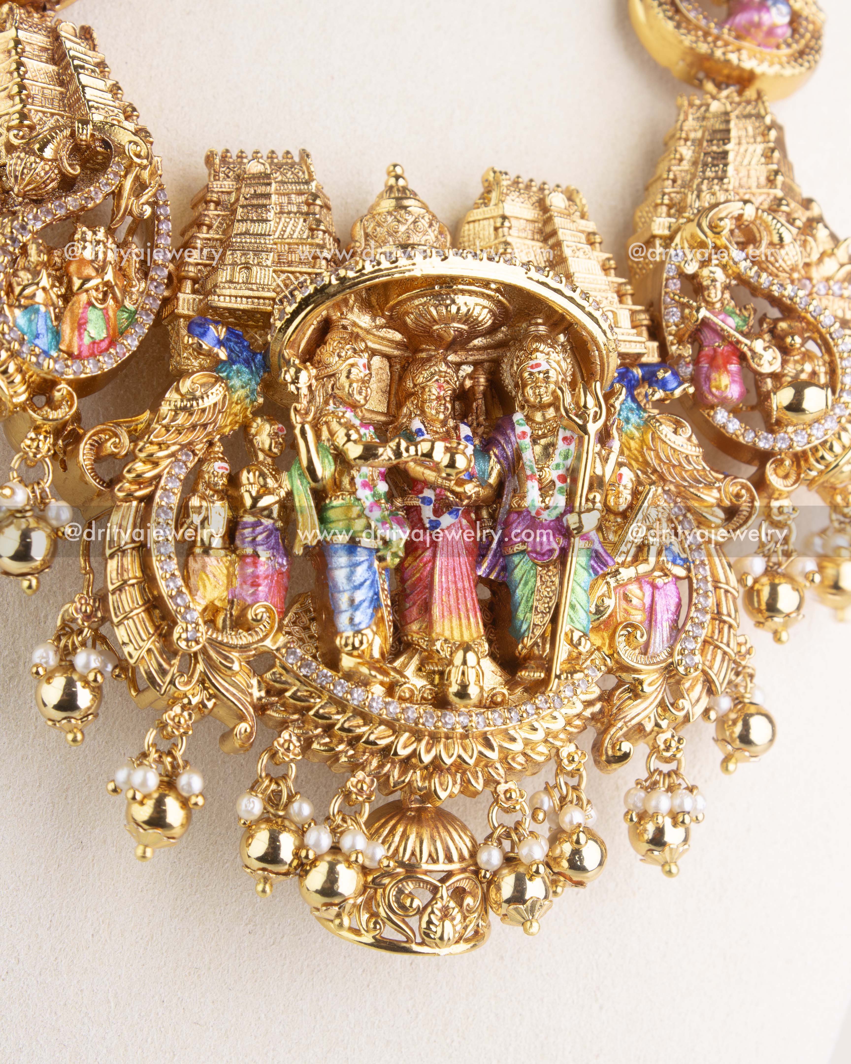 1220 Close-up of Shiva Parvati kalyanam pendant with meenakari work and pearl drops