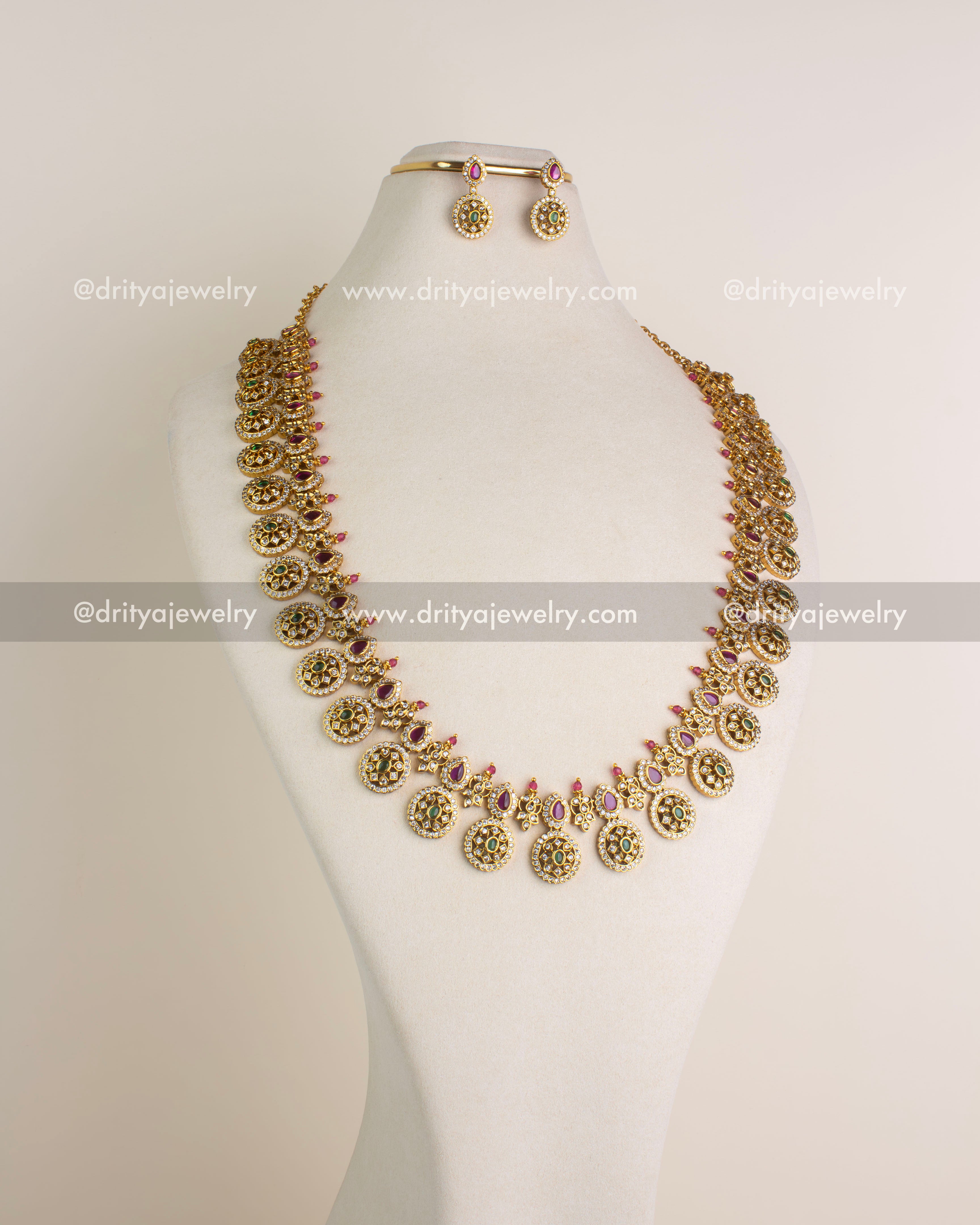 SKU 1153 Necklace Set front view showing full bottu mala necklace with matching earrings on bust display