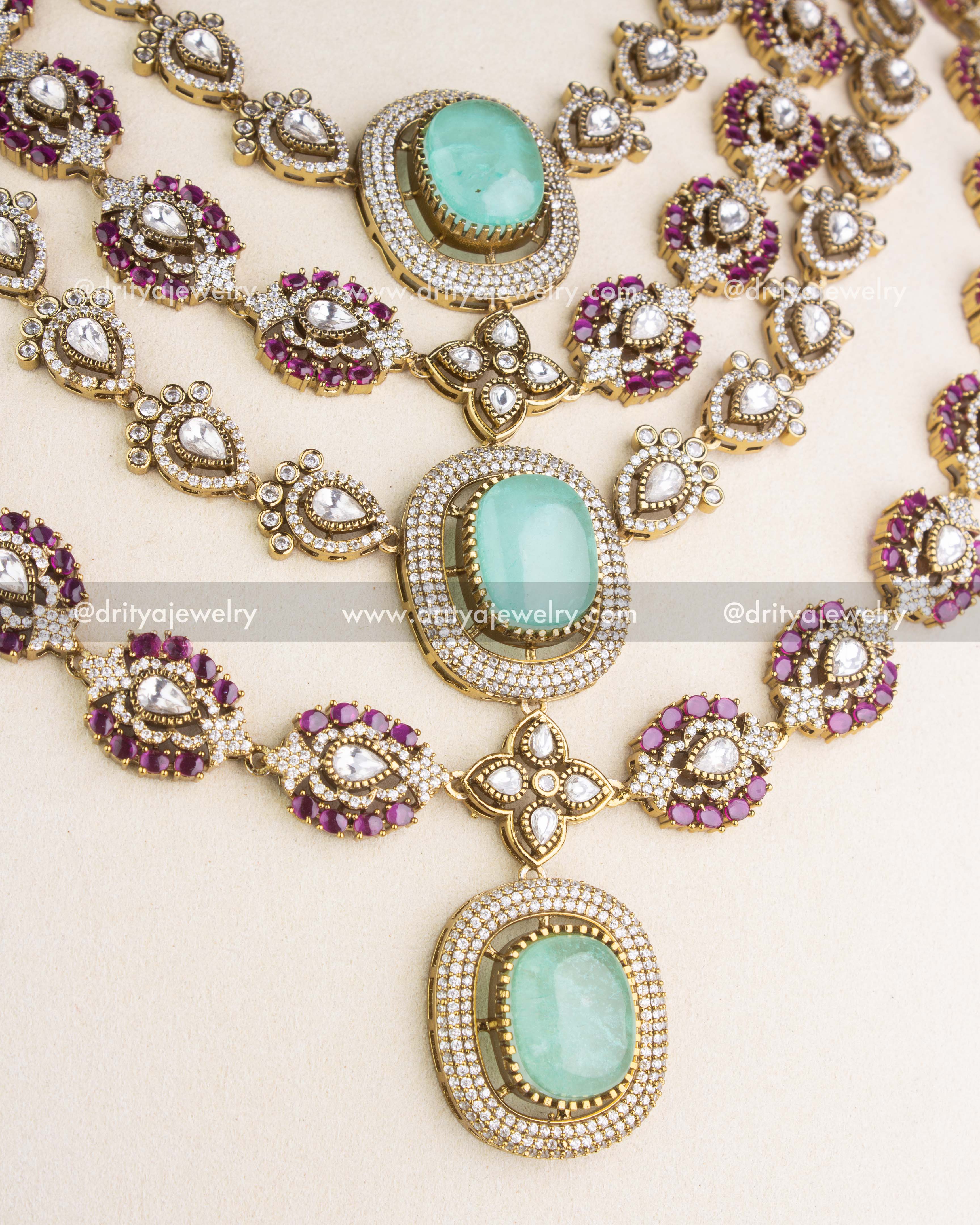 SKU 1131 Necklace Set close-up of layered polki kundan necklace with green centre stones and ruby accents
