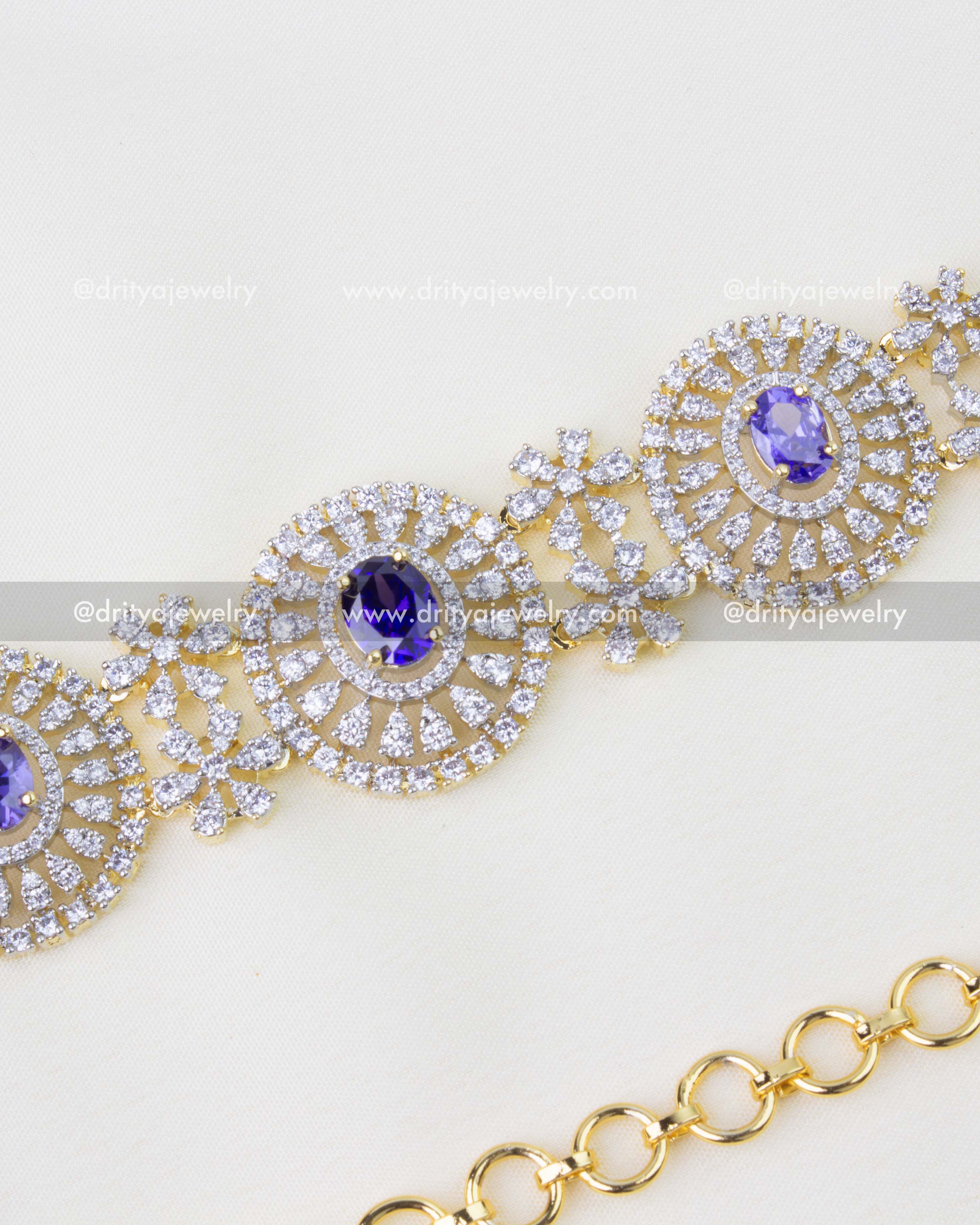 1291-PU close-up of oval purple stone medallion with CZ detailing on hip chain