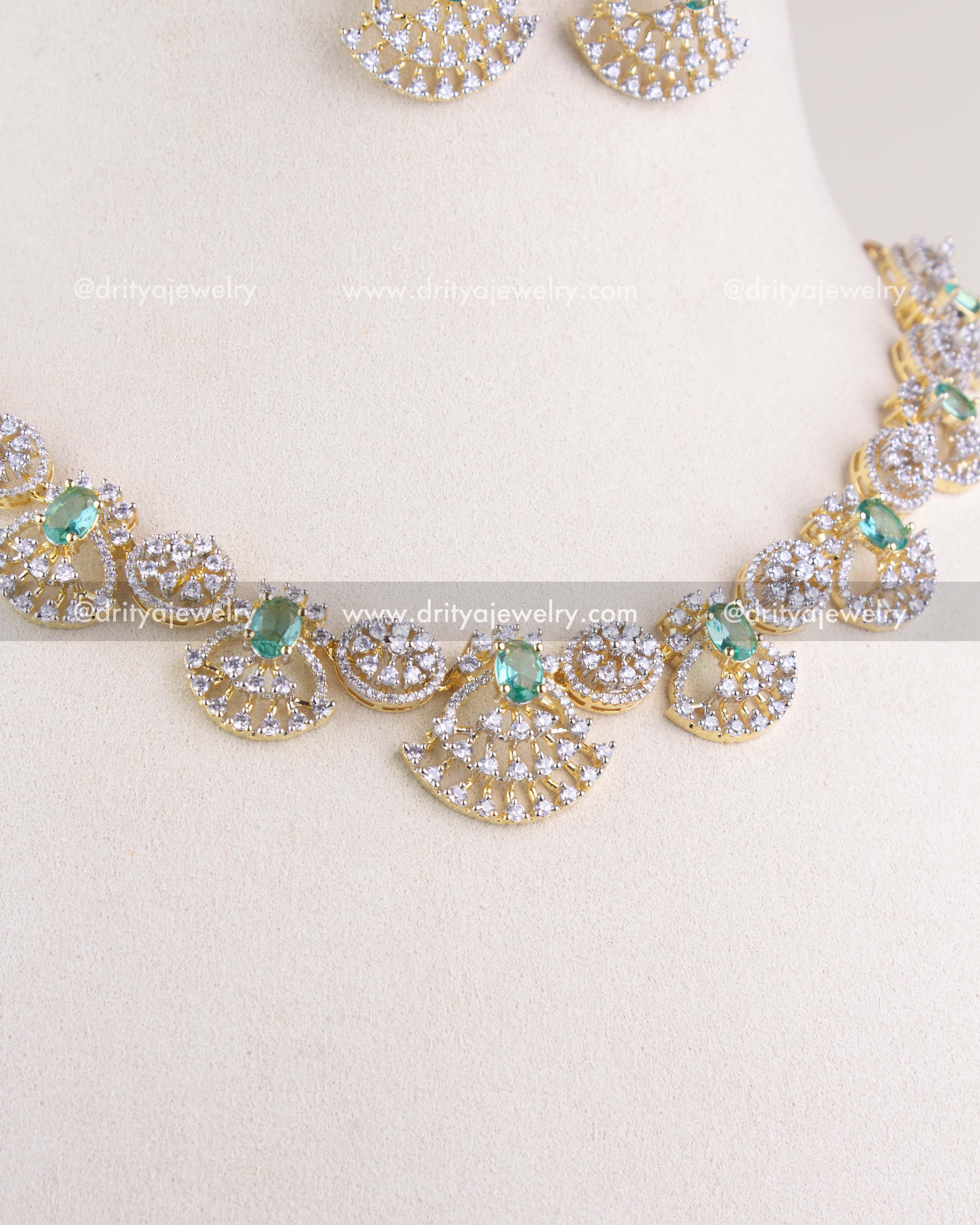1211-RE short necklace front view with matching earrings partially visible