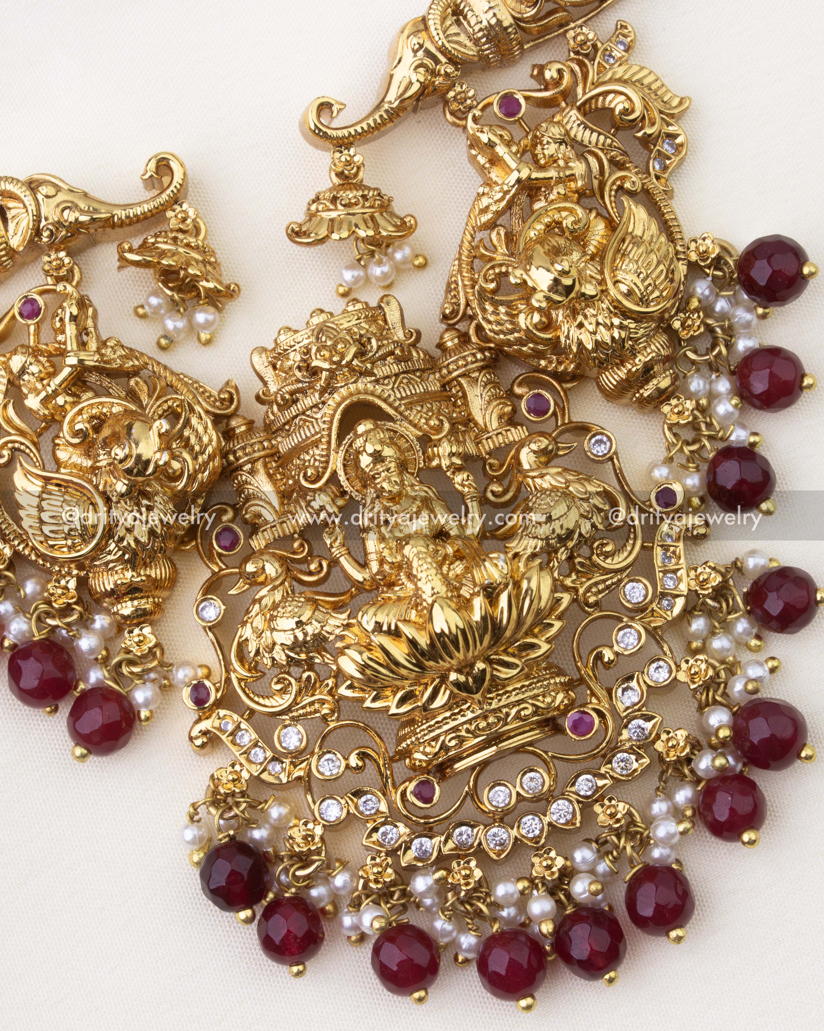 1263-R detailed view of god idol pendant with ruby beads and pearl-like drops