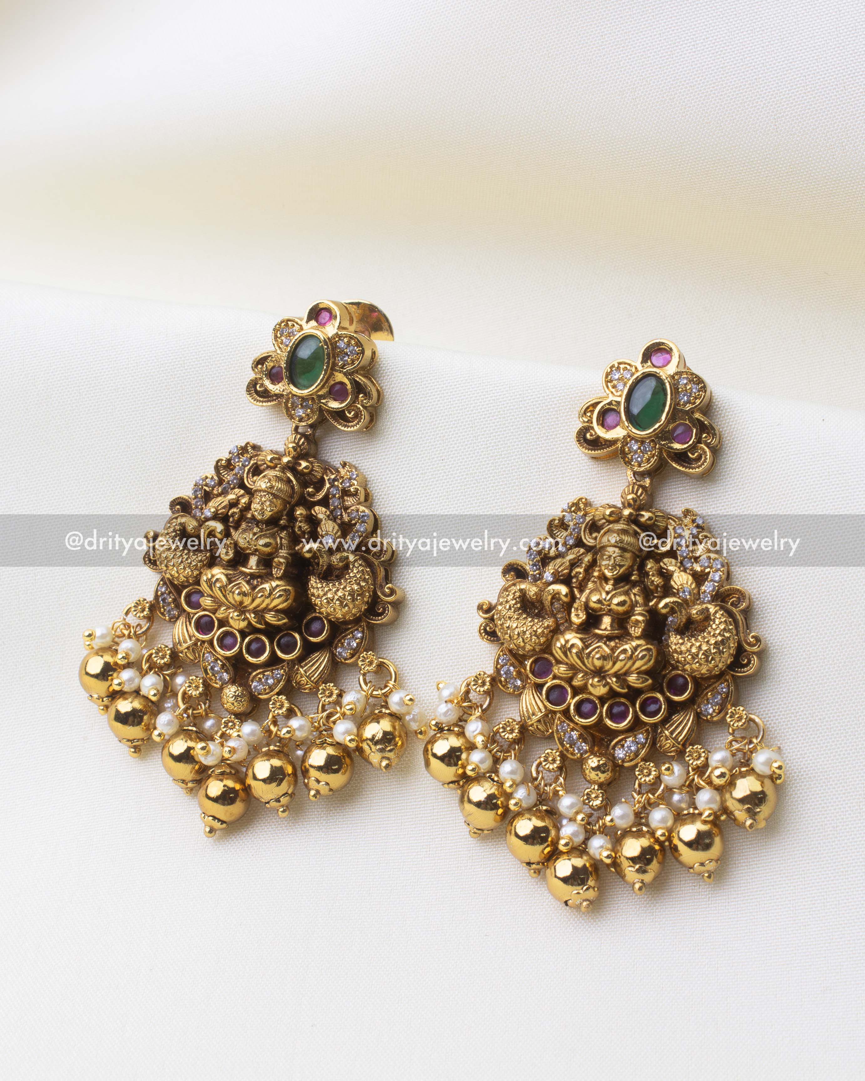 SKU 1250 temple earrings close-up showing god idol motif with pearl and gold bead drops