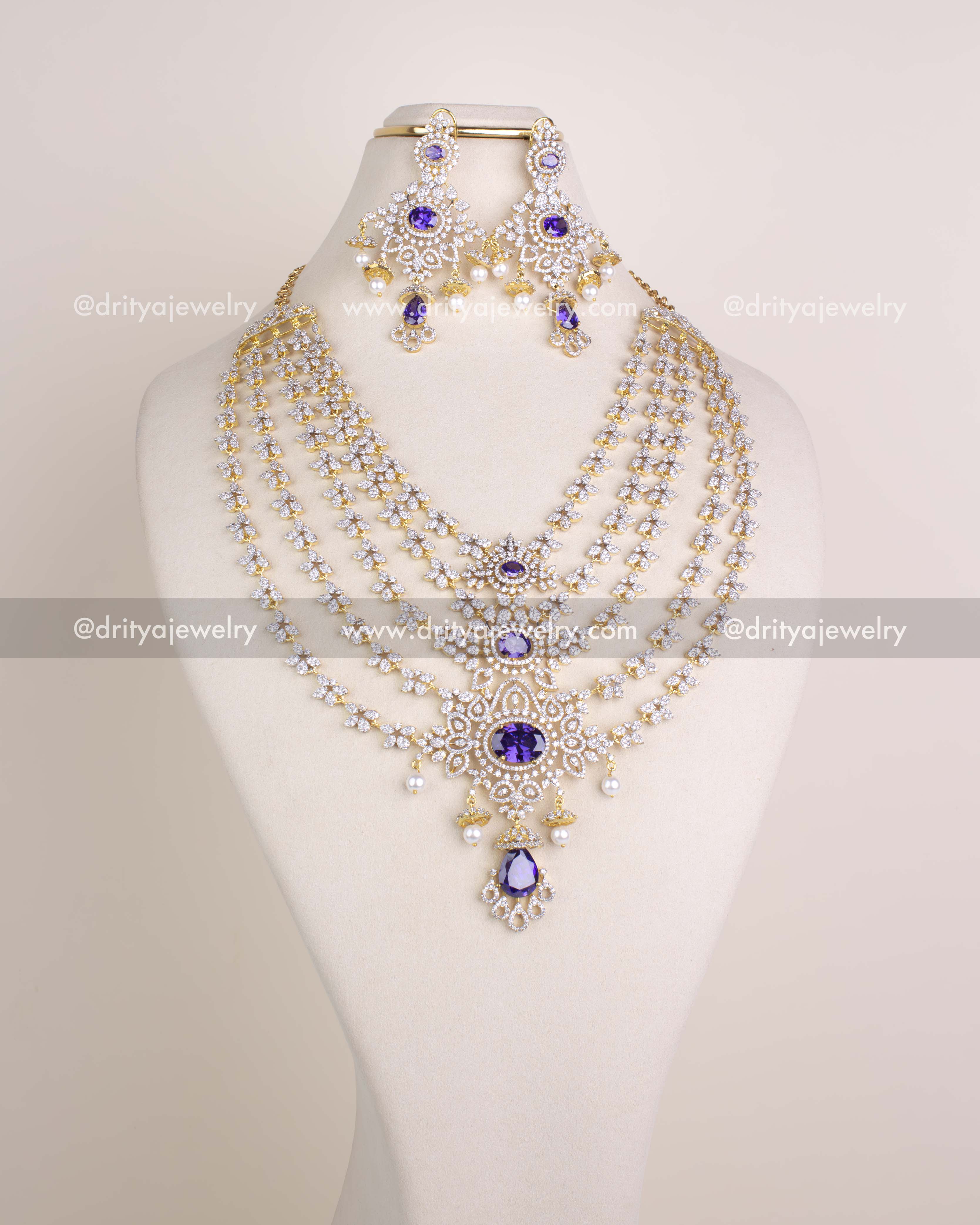 1230 - Multi-layer bridal necklace set with purple stones and matching dangler earrings front view