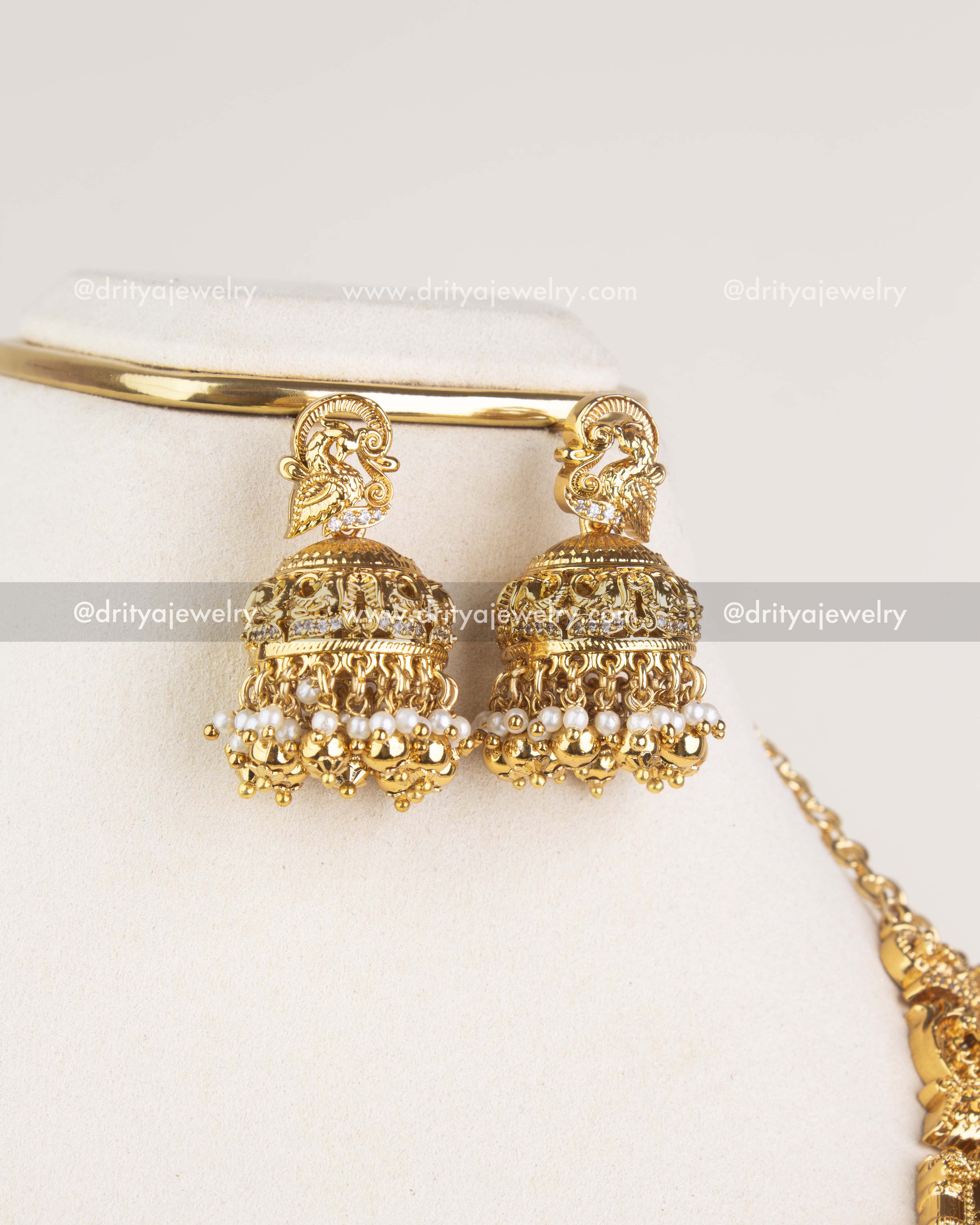 SKU 1124 - Necklace Set - Close-up of matching gold-toned temple jhumka earrings with pearl-like bead drops.