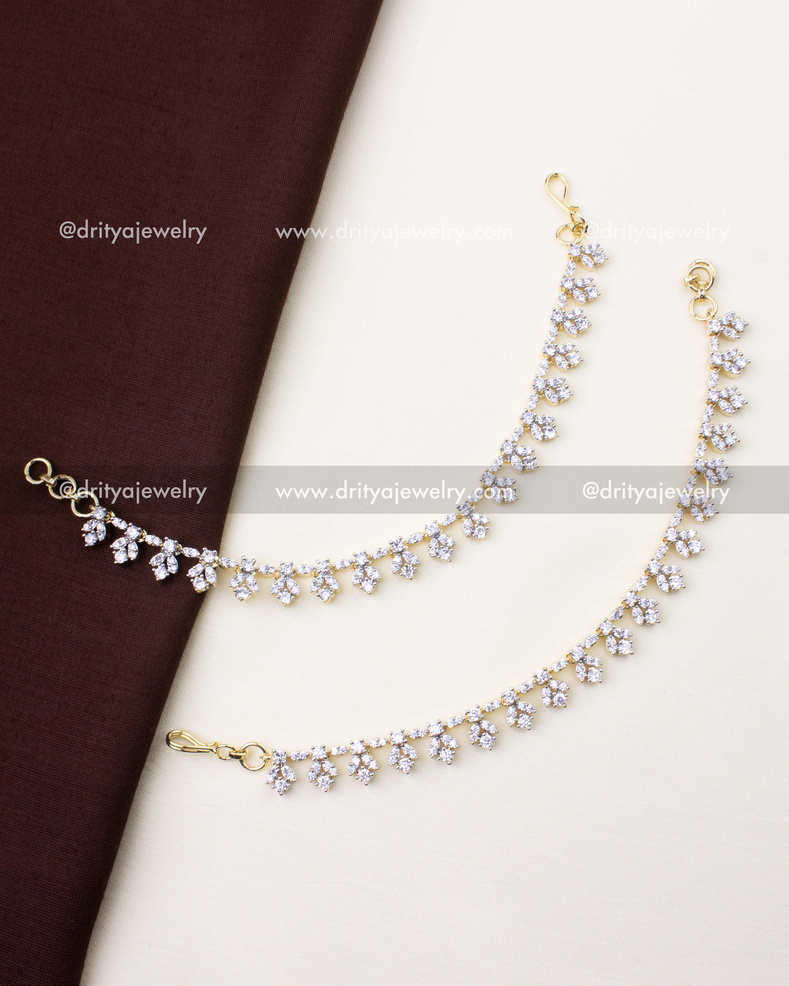 1233 - Full view of dual-tone CZ champaswaralu hair chains with hooks