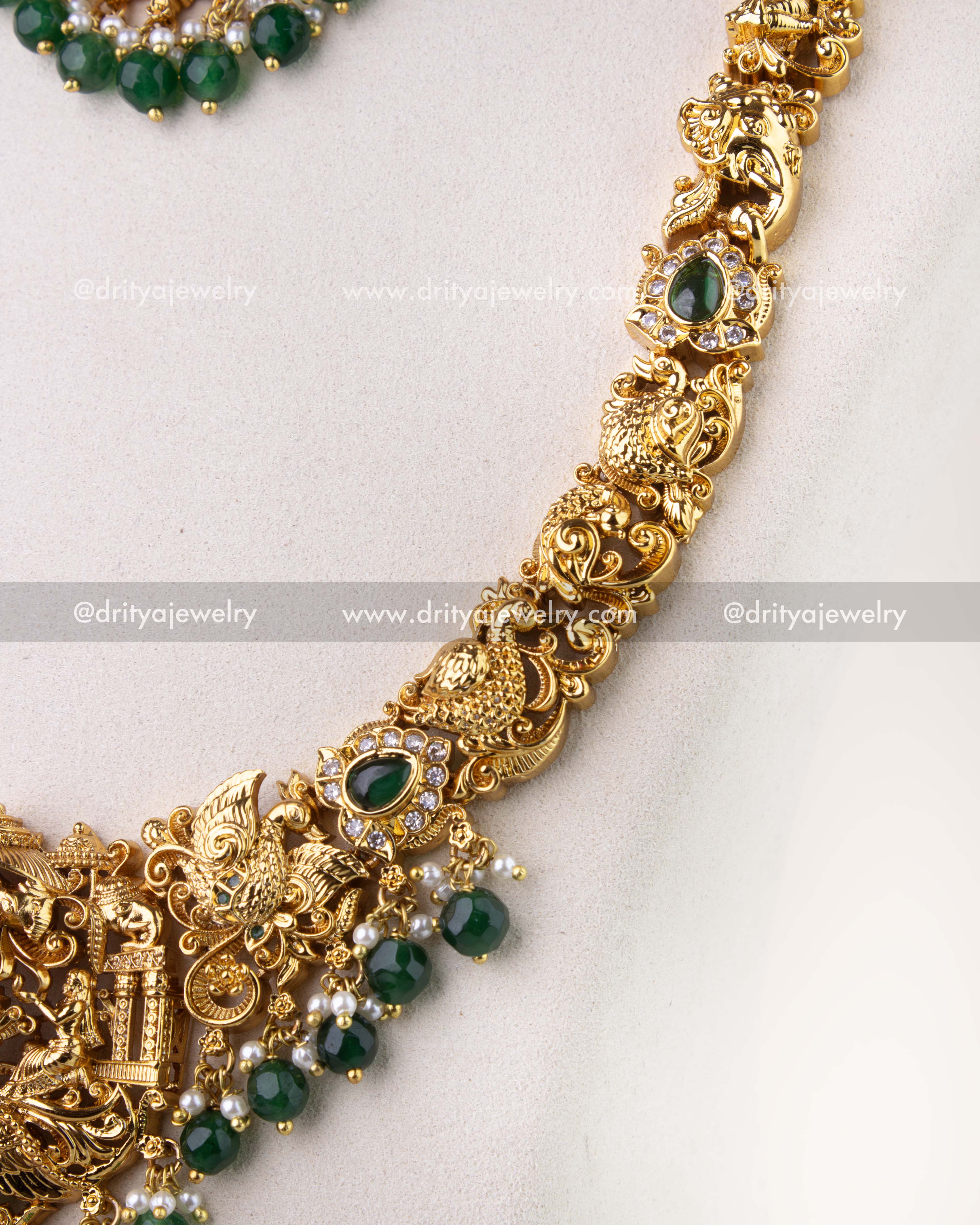 1270-G side view of god idol temple necklace with emerald green bead drops