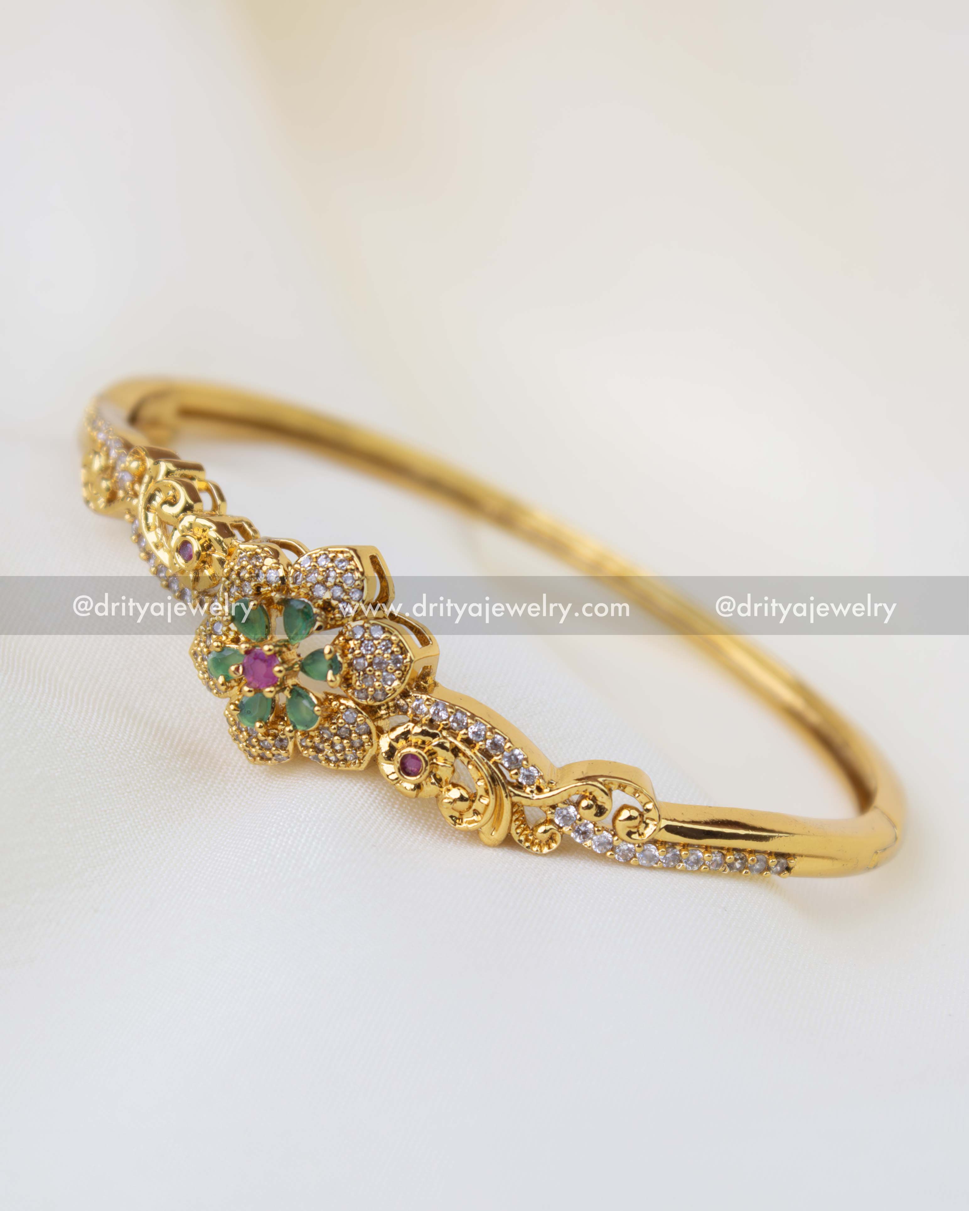 SKU 1256 side angle of stone-studded floral kada bangle with intricate detailing