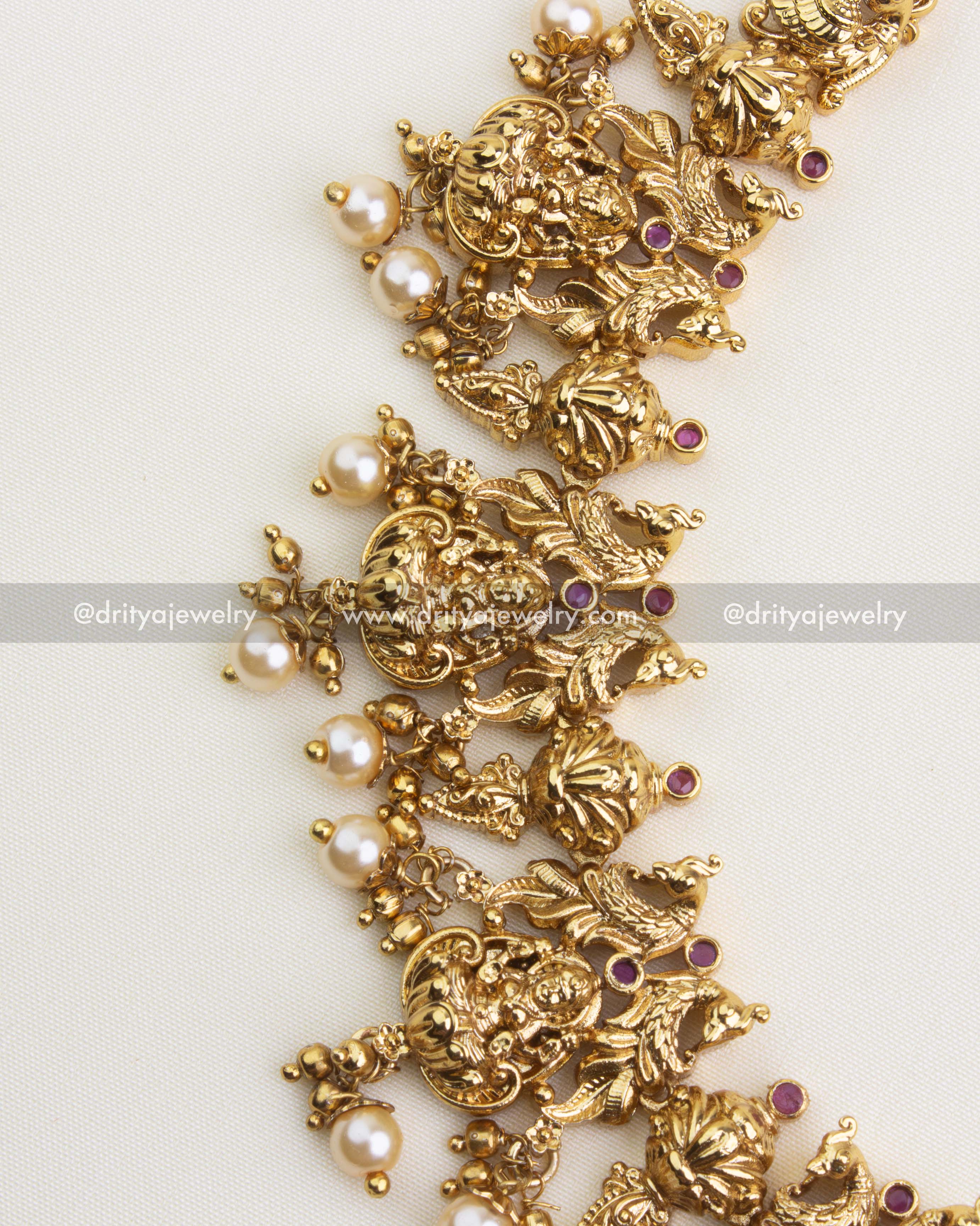 SKU 1127 Necklace Set angled view of linked temple motifs and dangling pearls