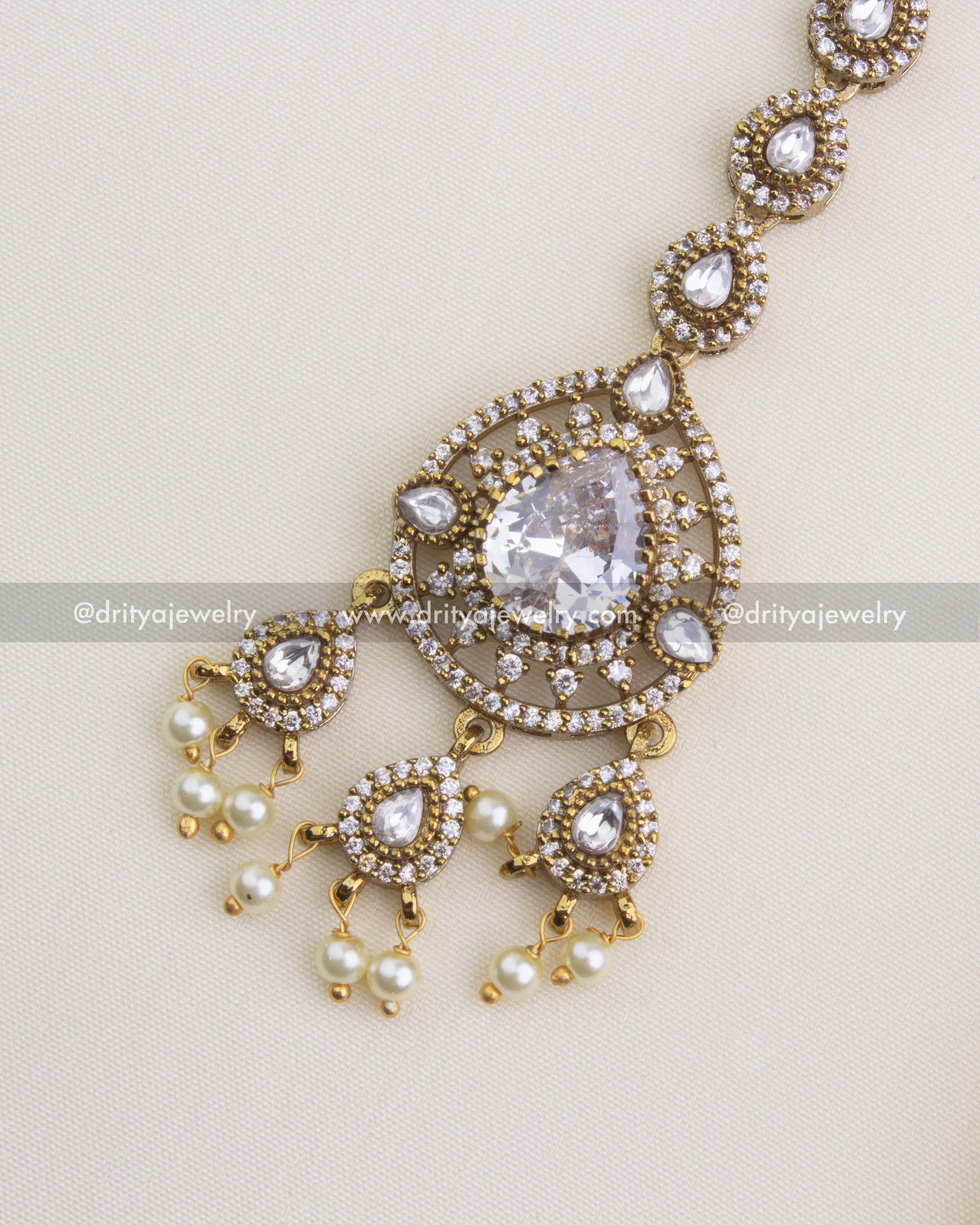 Close-up of Victorian-style white stone and pearl drop damini pendant of maang tikka, SKU 1112-W