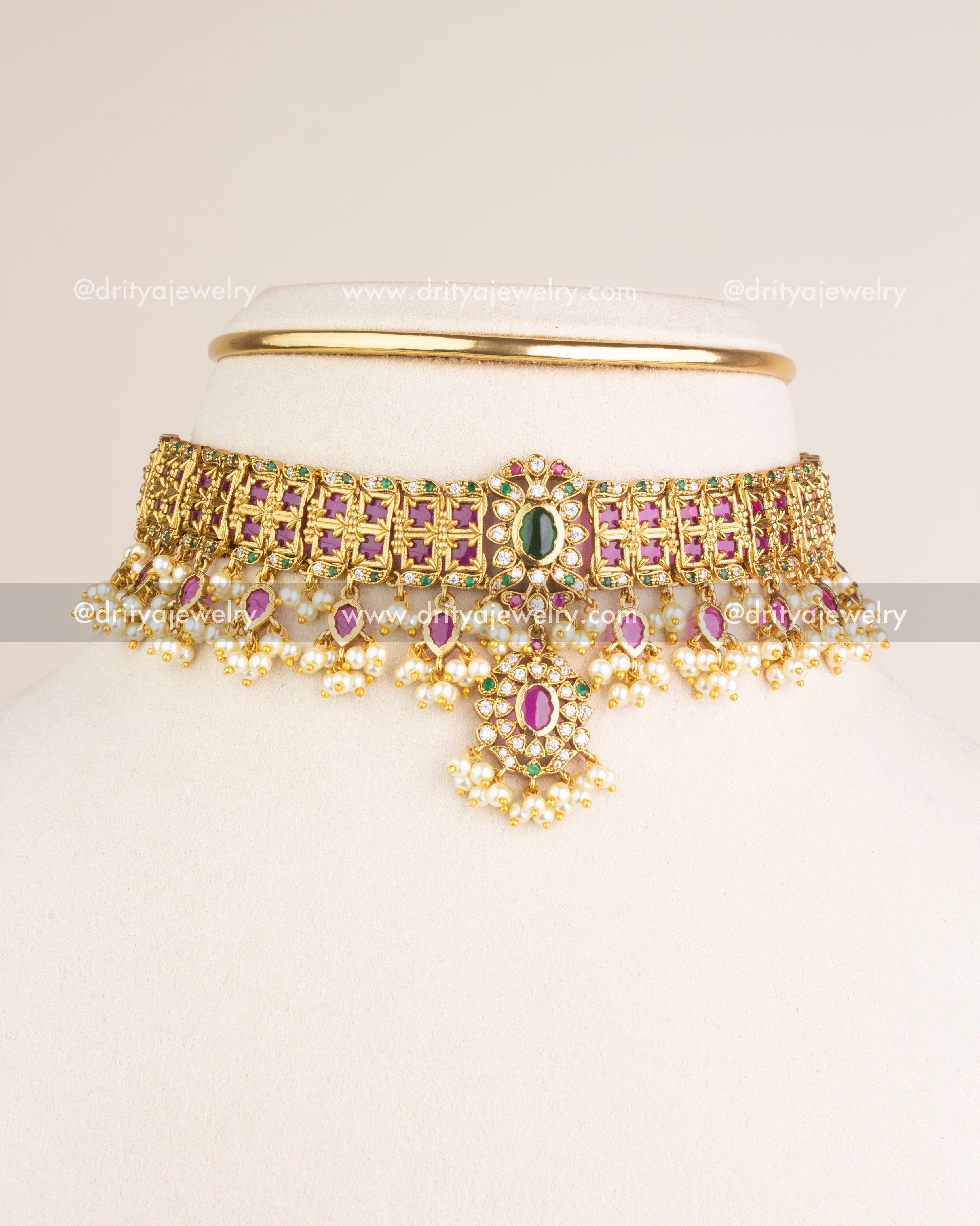 SKU 1140 Necklace Set full front display of gold guttapusalu choker on bust stand