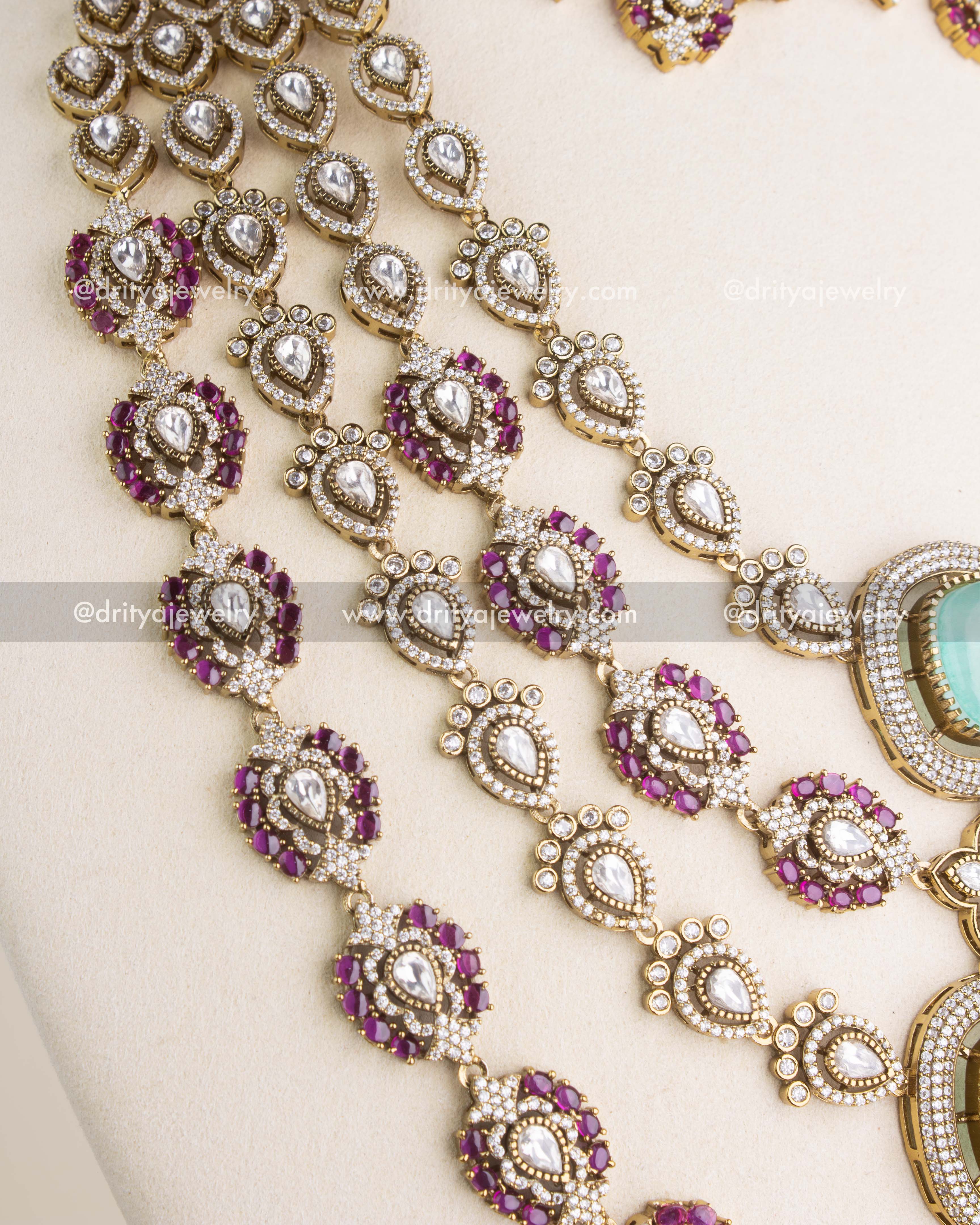 SKU 1131 Necklace Set side close-up of layered polki kundan strands with ruby detailing