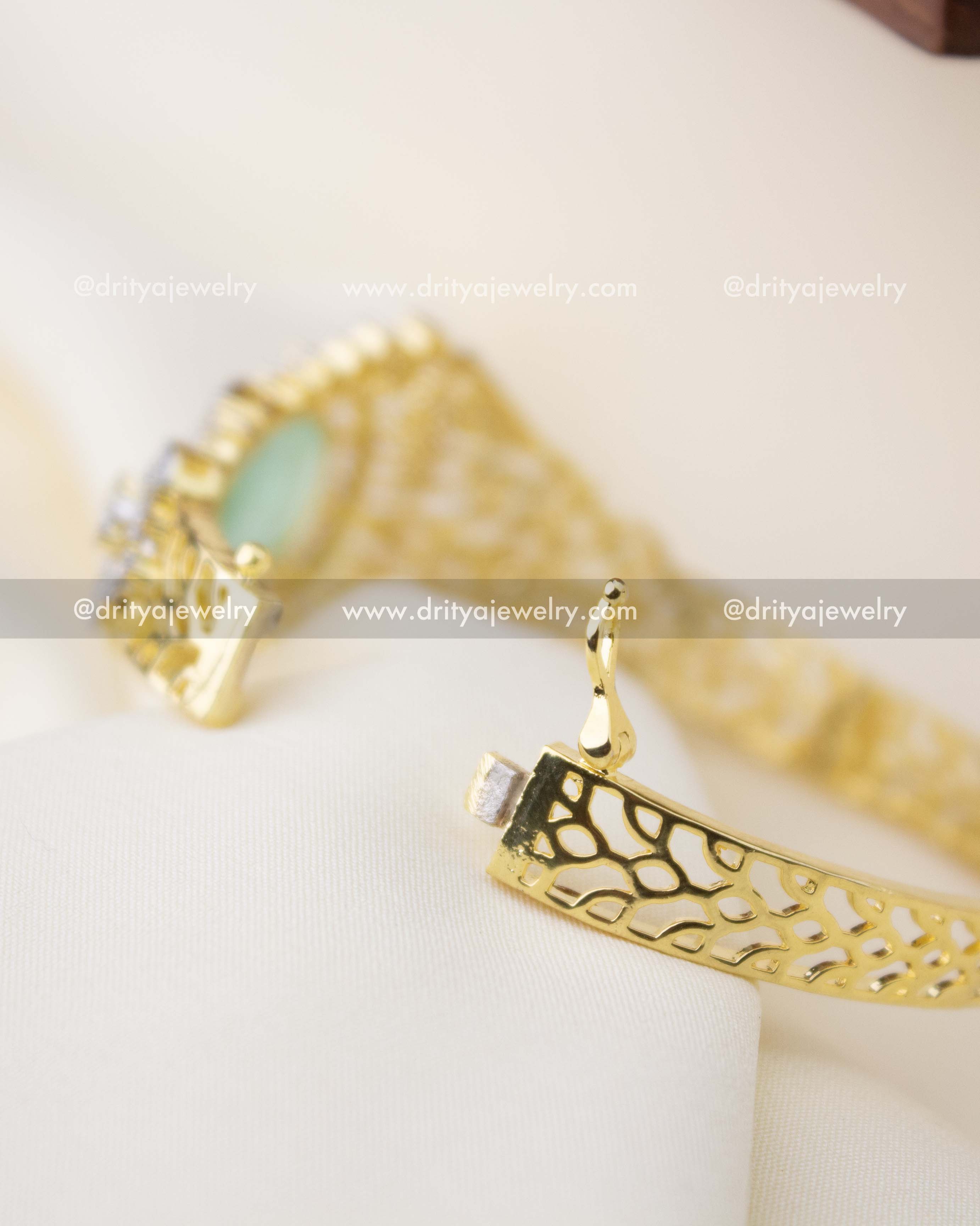 1295-MG openable kada showing hinge mechanism and cutwork gold band