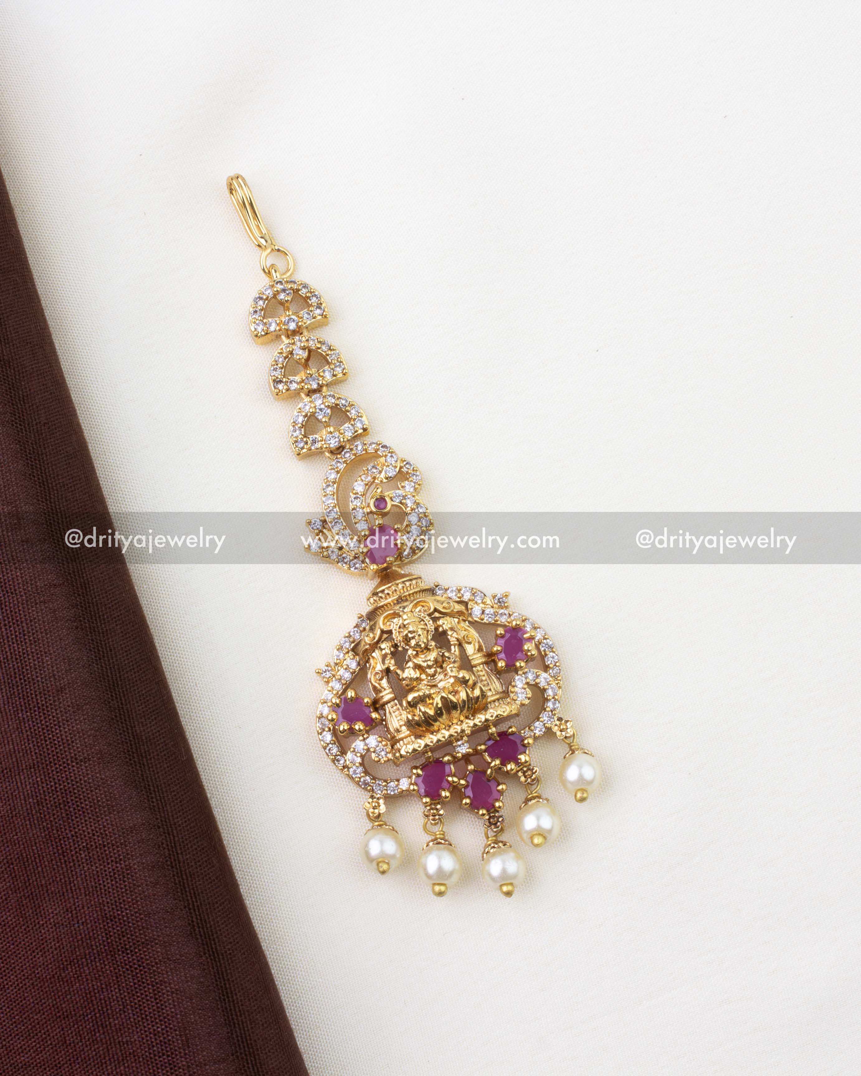 1297-R full view of ruby red temple god idol maang tikka with gold finish
