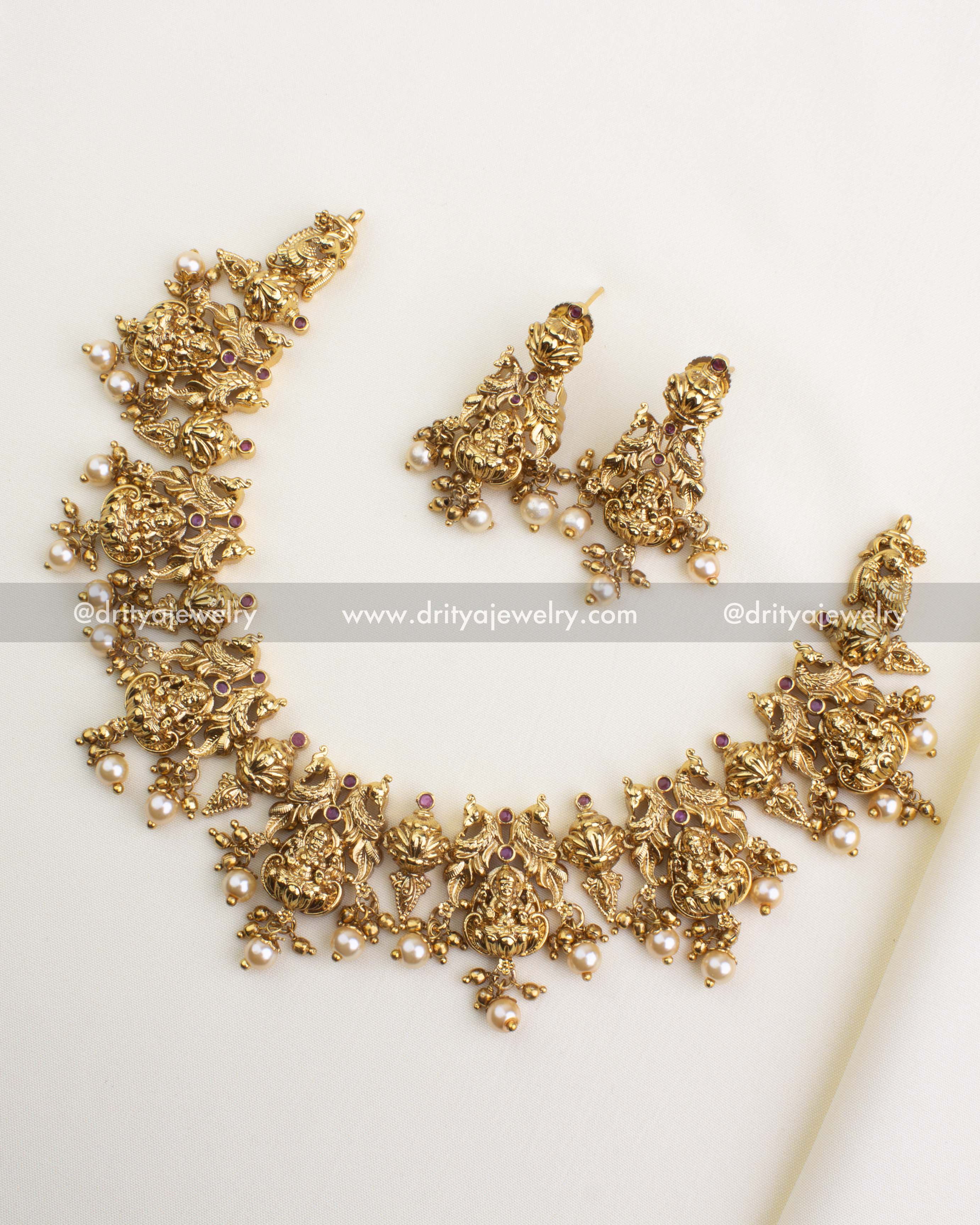 SKU 1127 Necklace Set full view of short temple necklace with earrings laid flat