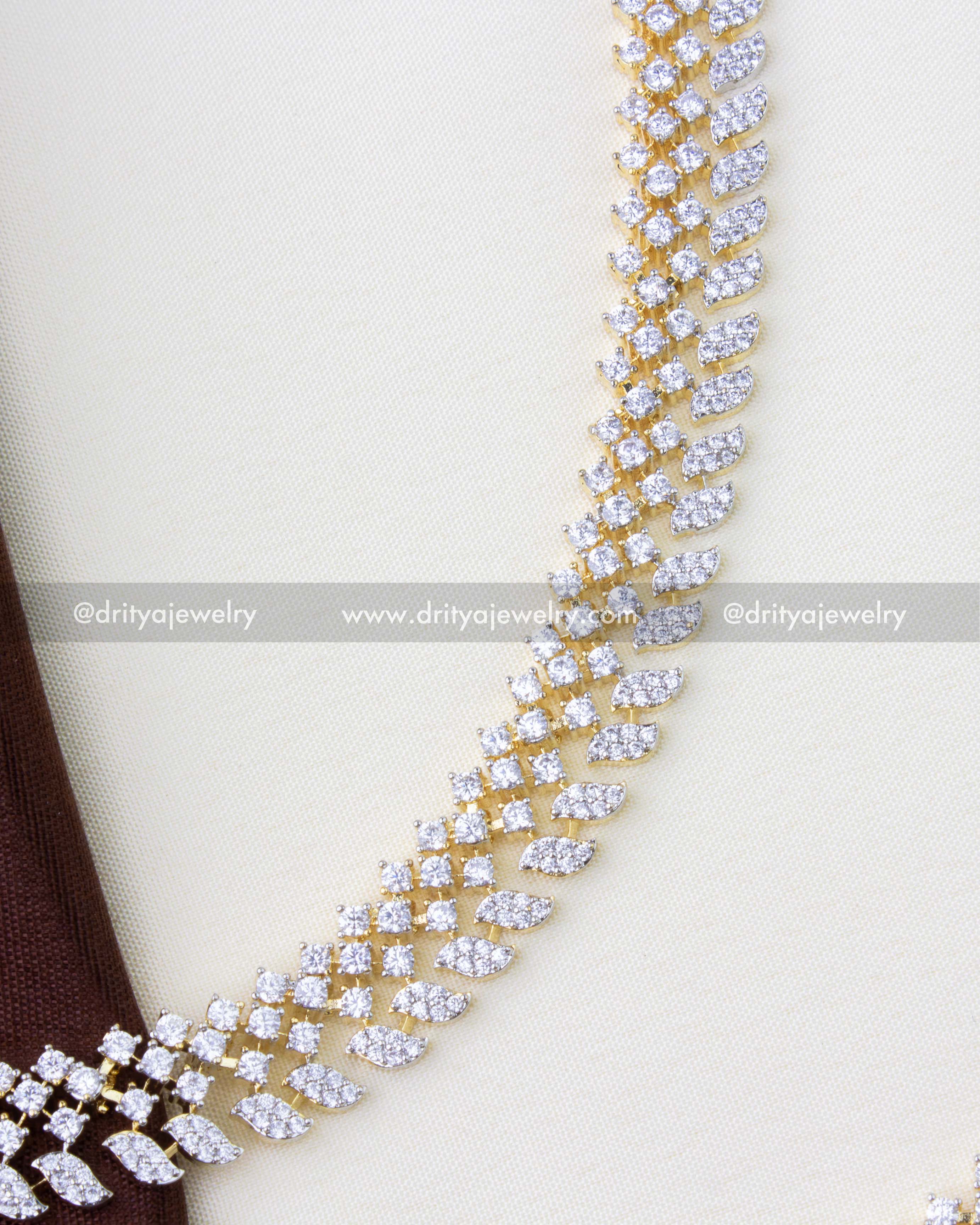 1272 - Close-up of premium CZ champaswaralu hair chain with dual-tone finish