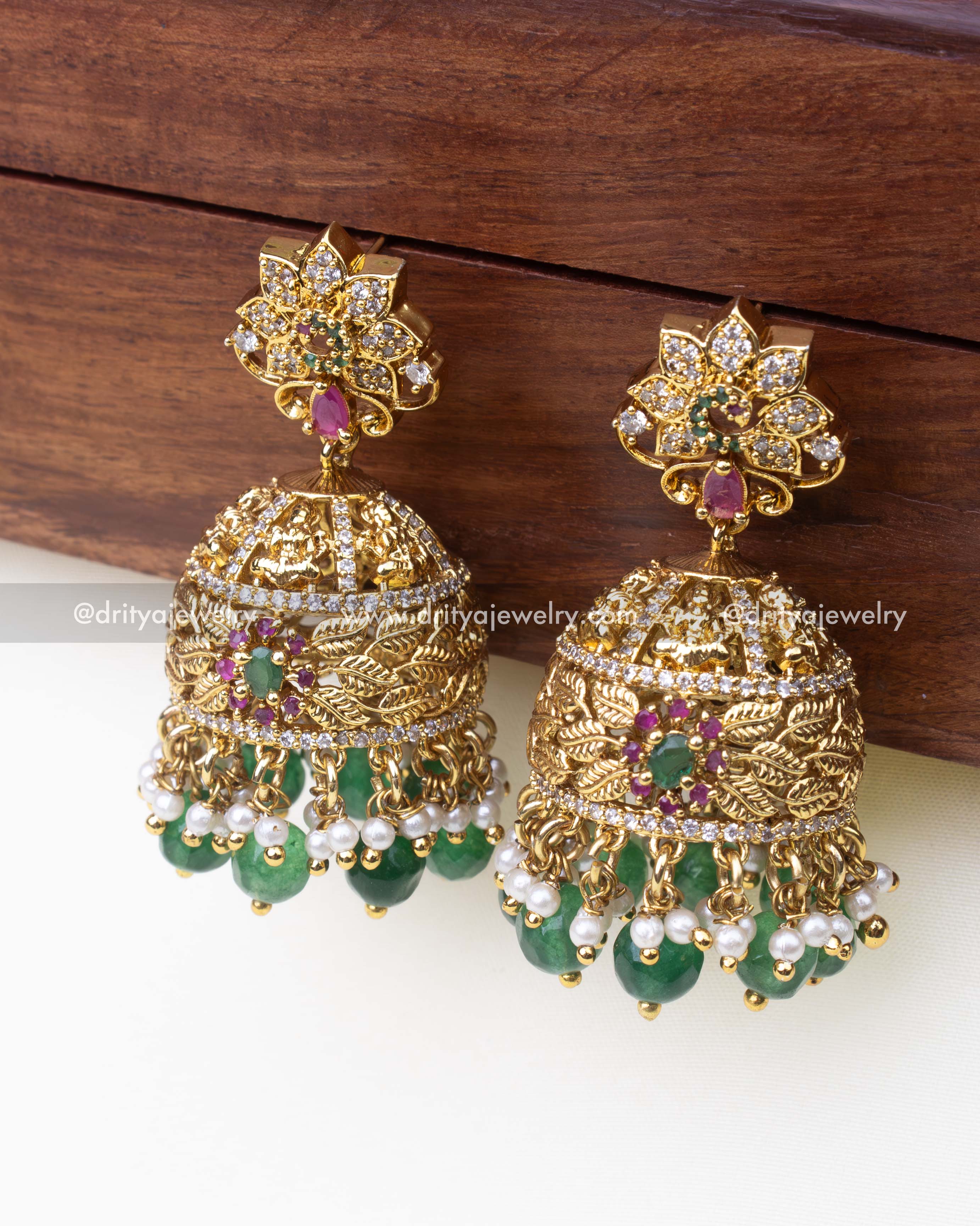 1241-G premium temple jhumka earrings close-up front view with green beads and pearl drops