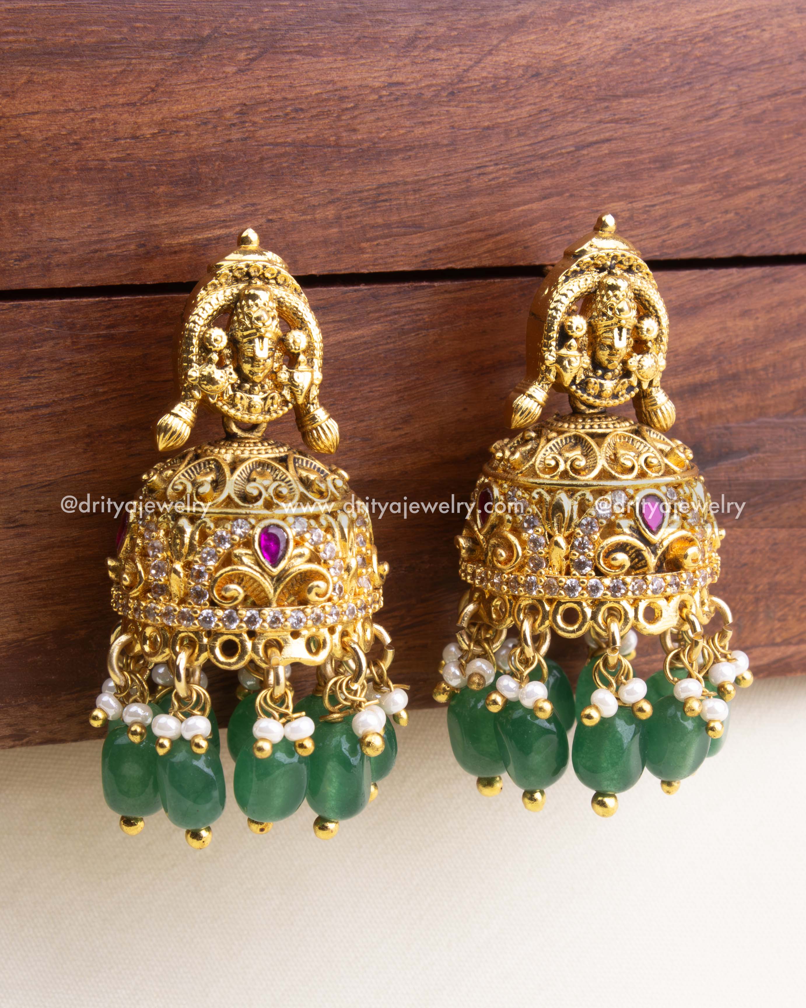 1123-ER - Earrings - Front close-up view of god idol nakshi jhumka with green bead drops