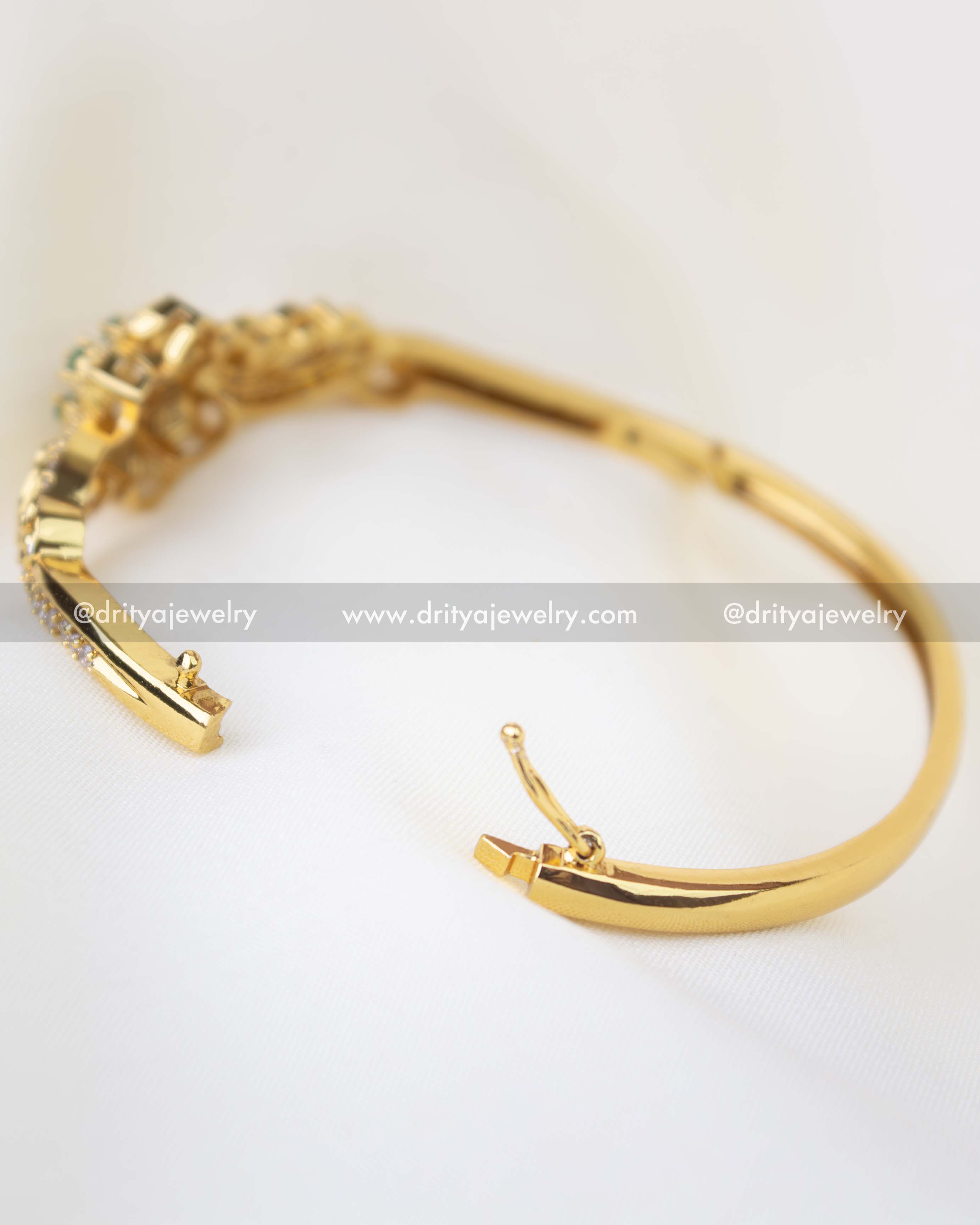 SKU 1256 openable floral kada bangle showing hinge and latch mechanism