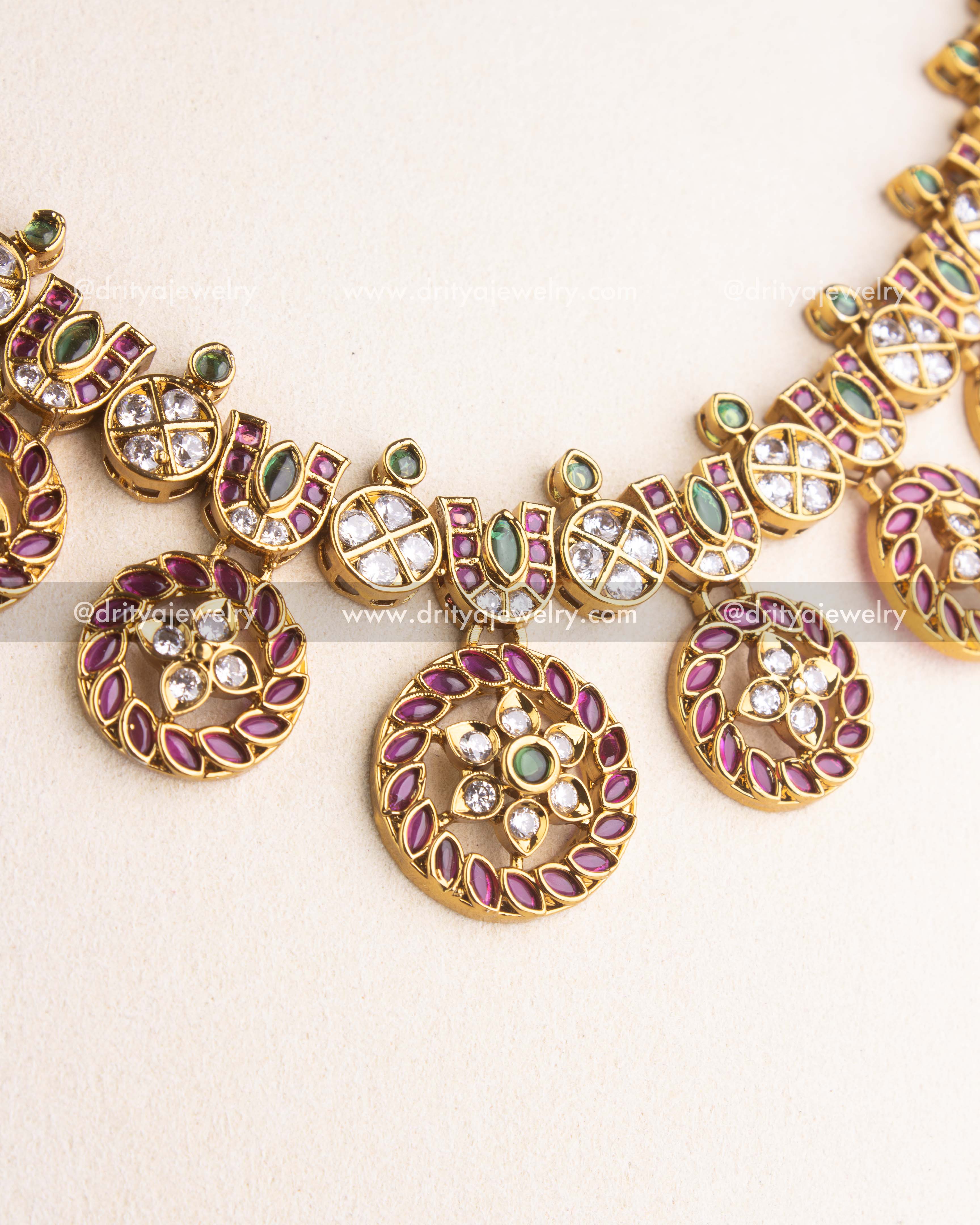 SKU 1158 Necklace Set angled view showing circular butta drops and CZ stones