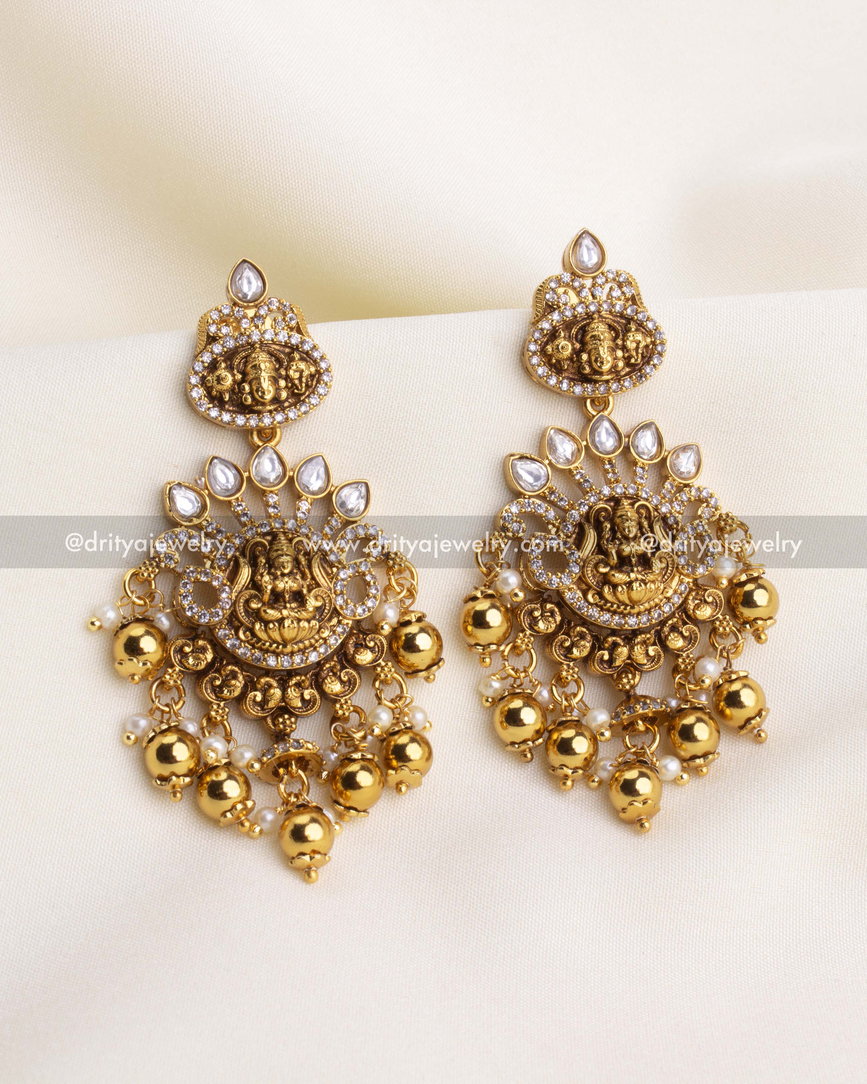 SKU 1200 temple-style Lakshmi earrings with gold beads and stone-studded detailing front view