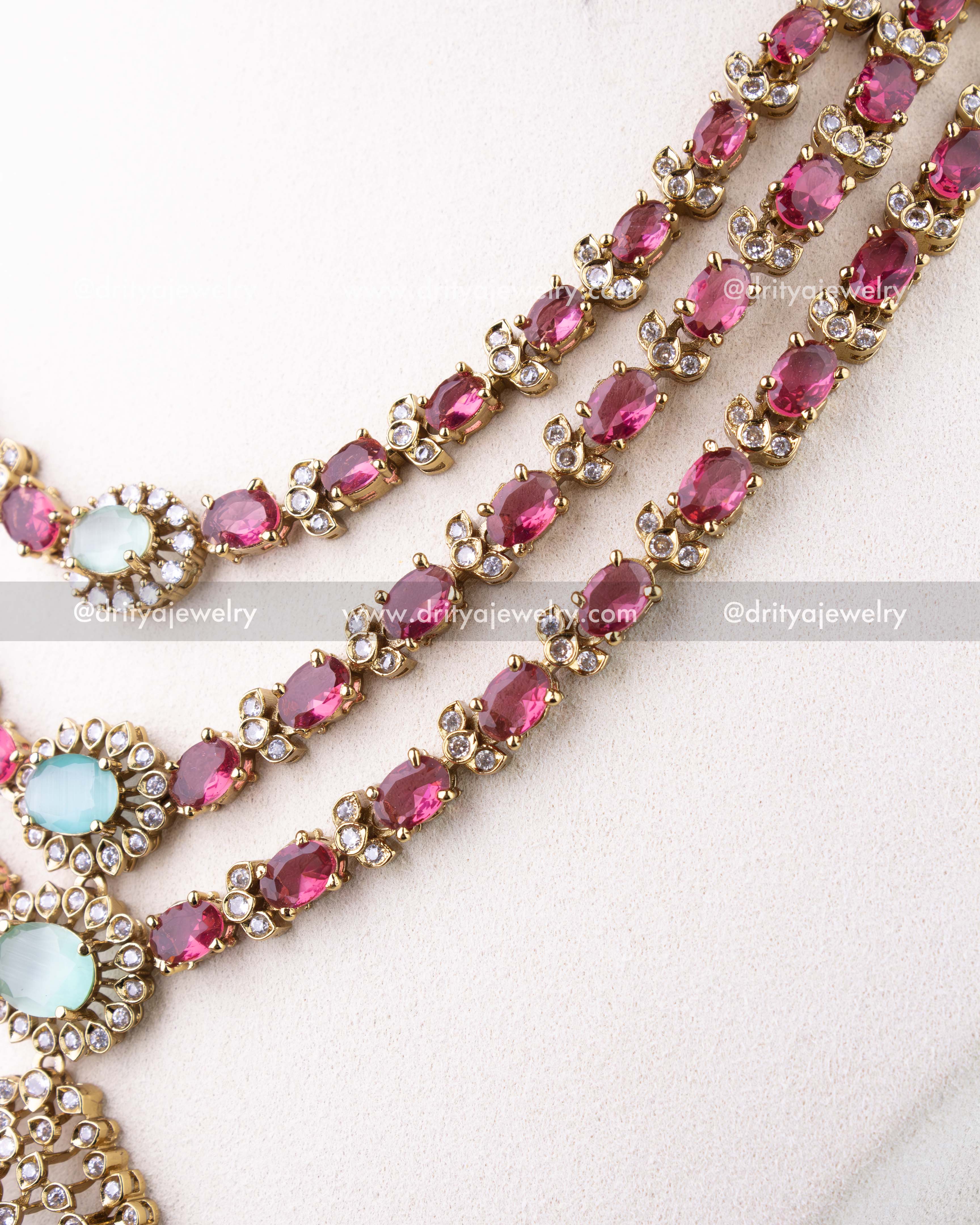 1296-R detailed view of ruby red stone strands and crystal accents on necklace