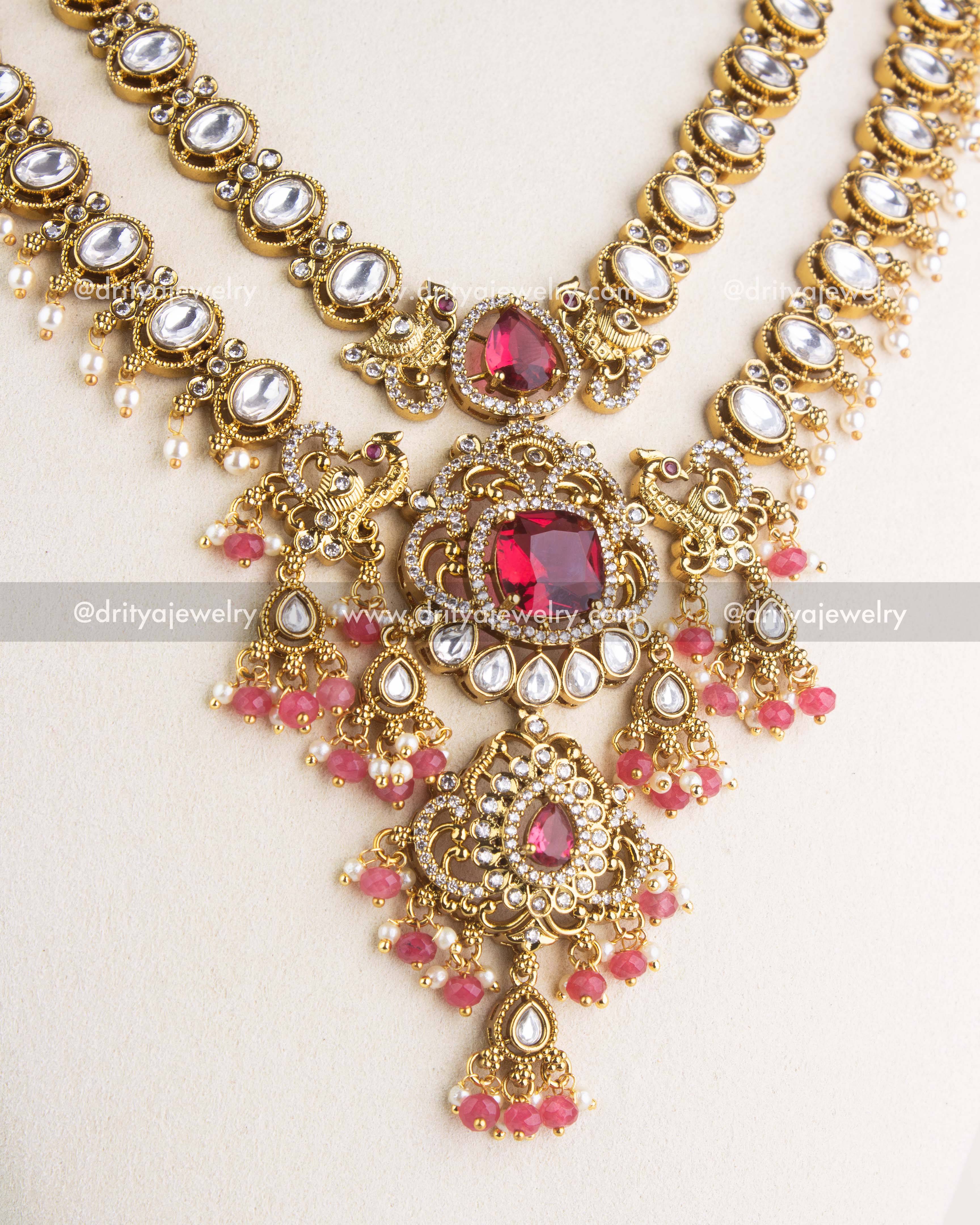 1156-R - Necklace Set - Detailed view of central ruby-toned pendants and bead hangings