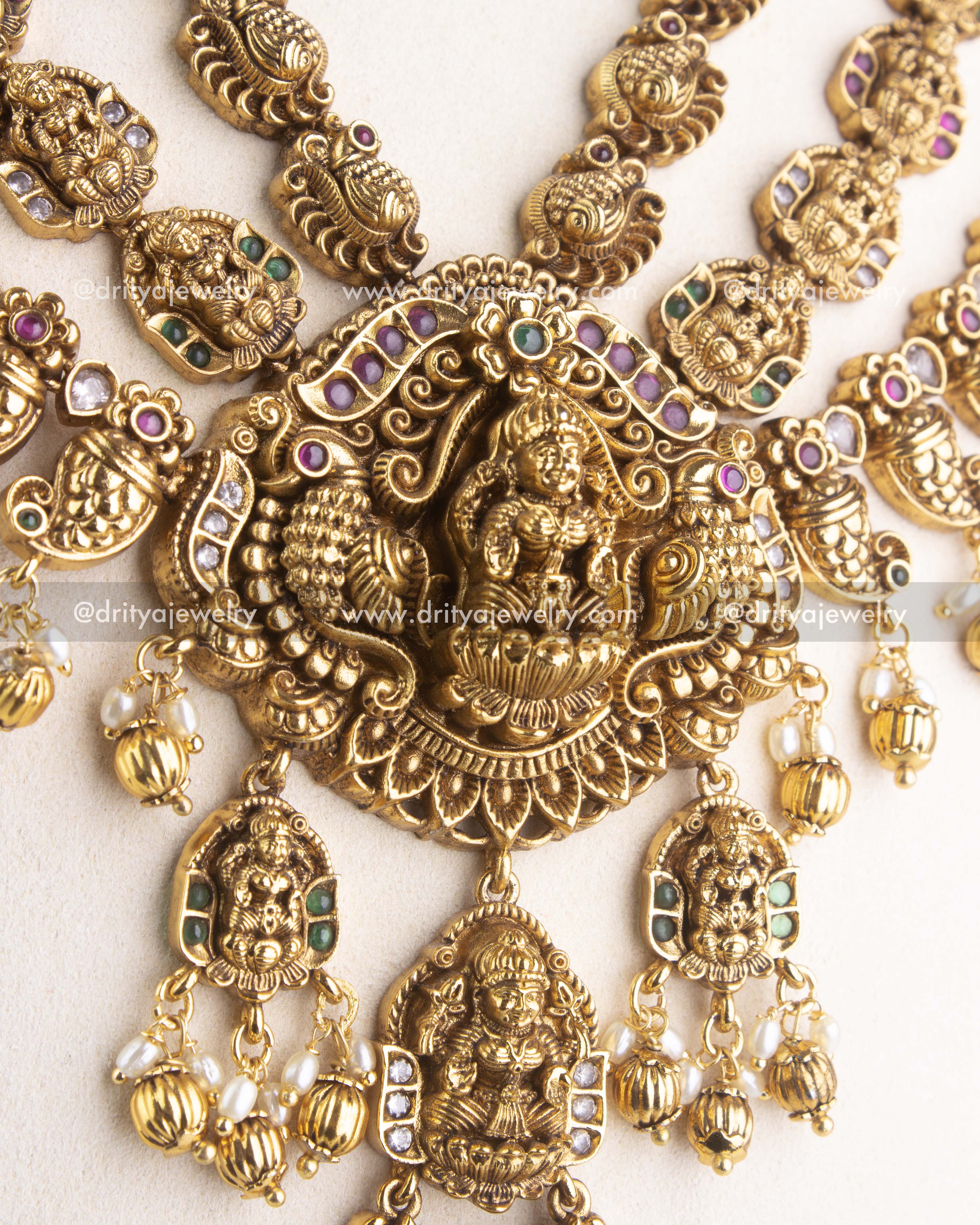 SKU 1162 Necklace Set close-up of central god idol pendant with layered drops