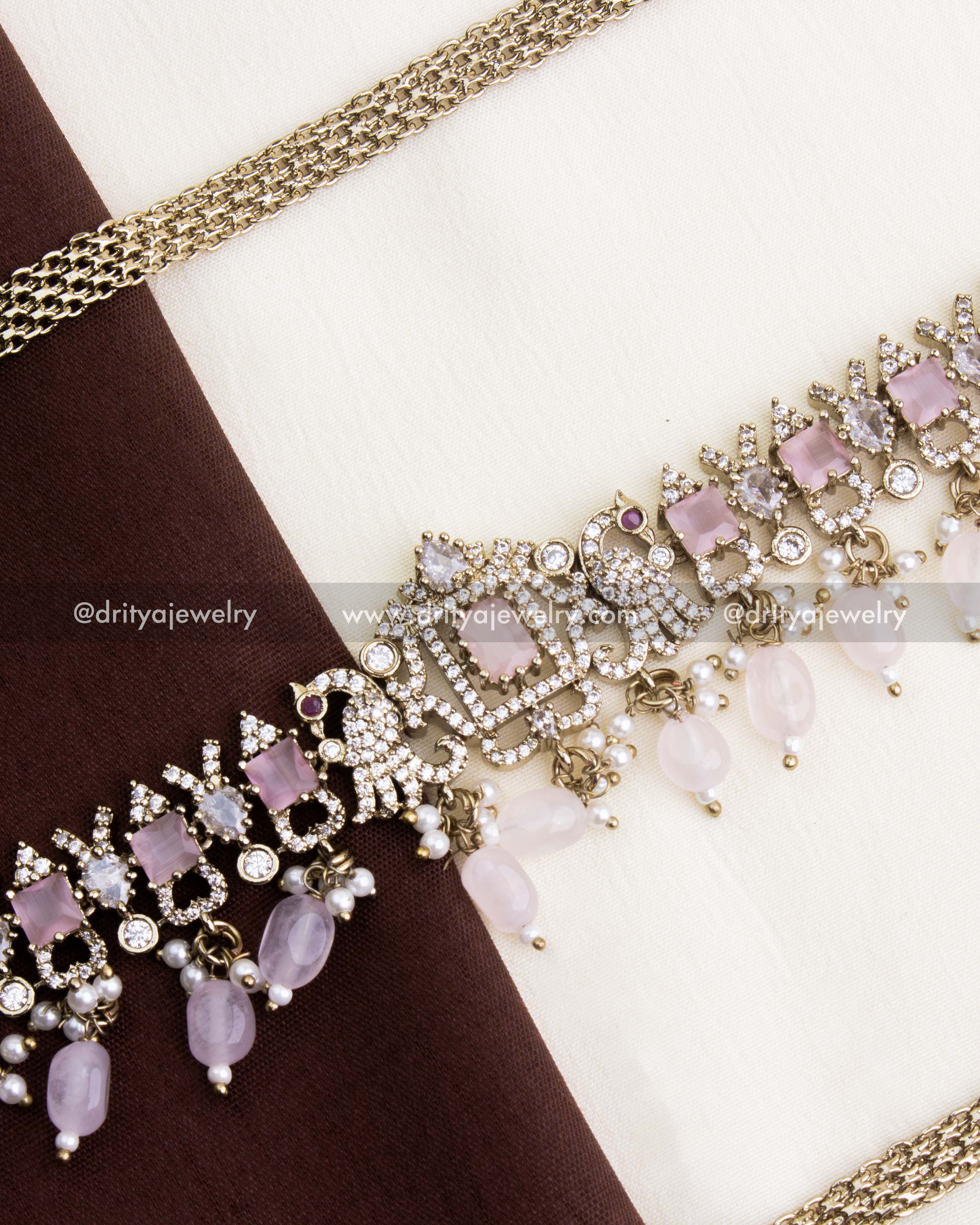 1130-BP Victorian hip chain mid view showing figurine-style motif and dangling pink beads