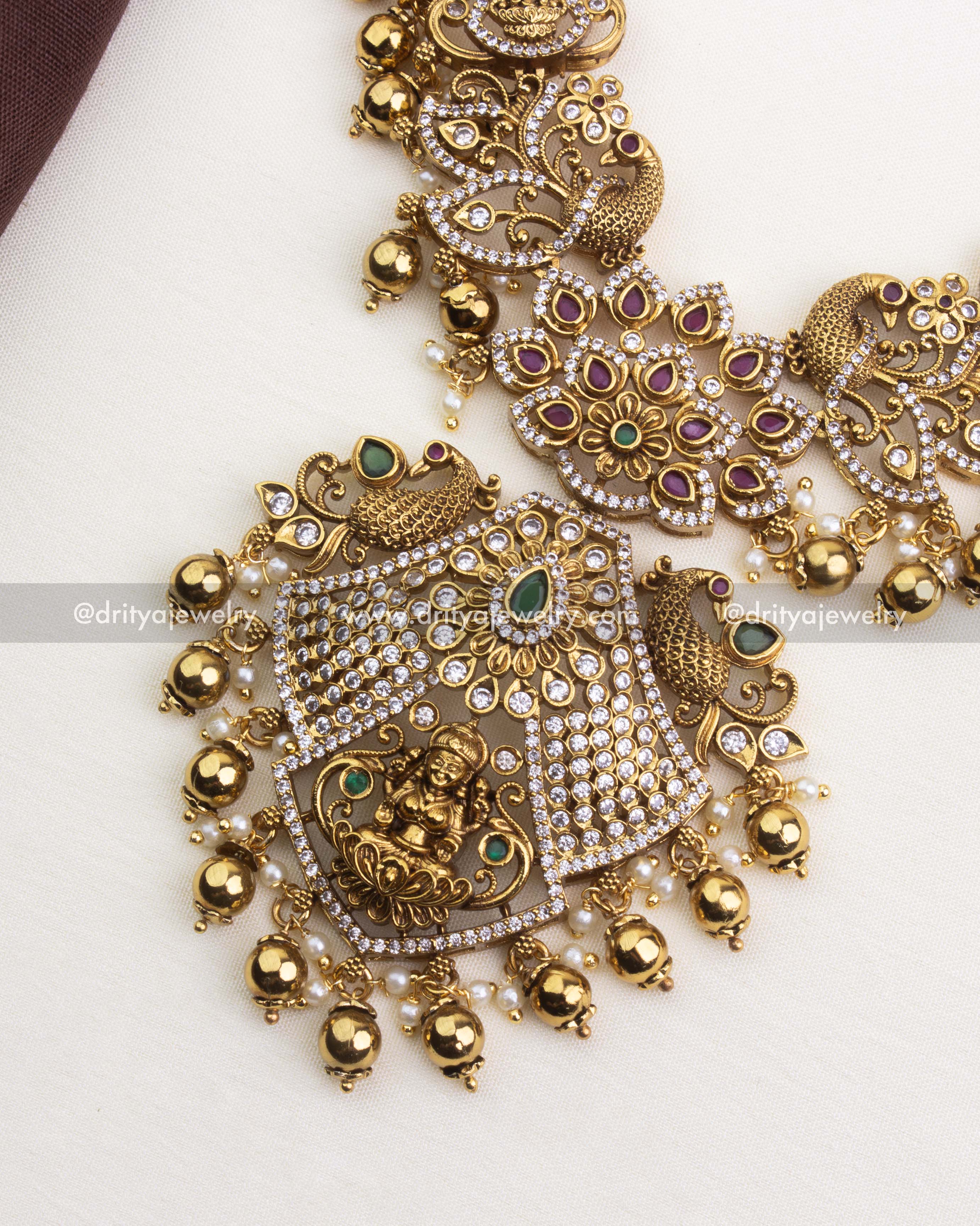 SKU 1252 - Close-up of temple necklace pendant with god idol and antique finish