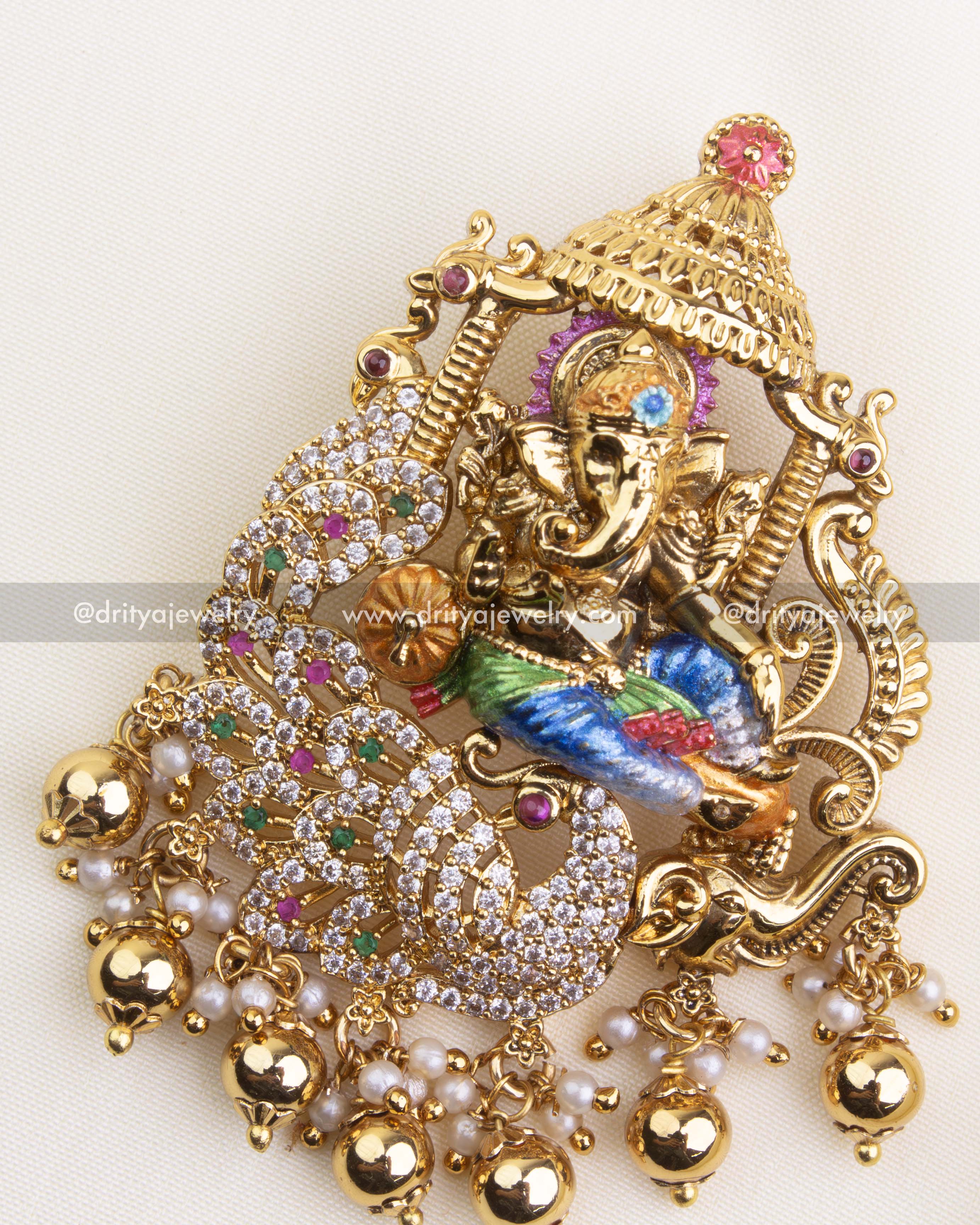 SKU 1116 close-up of Ganesha pendant highlighting CZ stones, peacock motif and gold finish