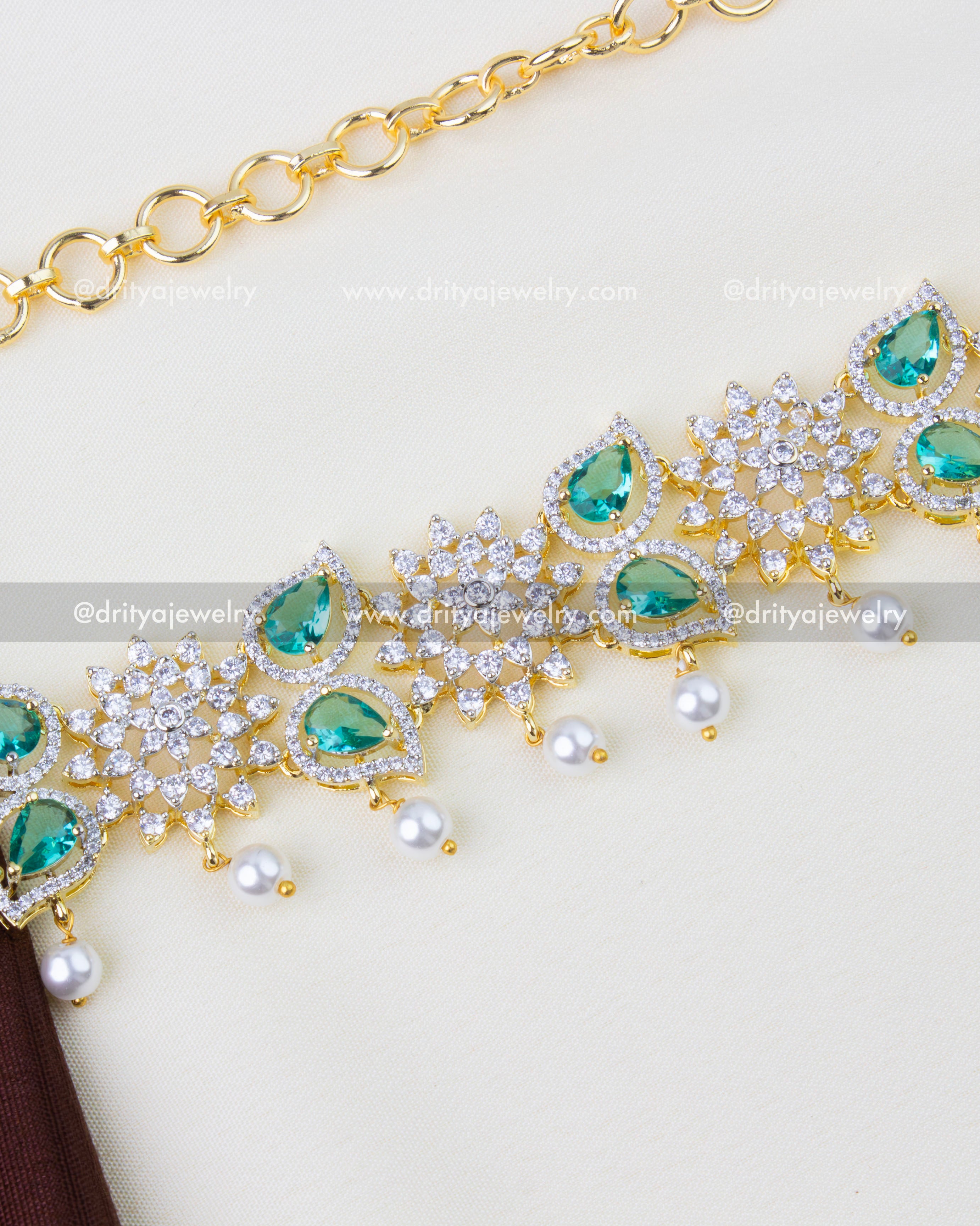 1289-RE premium emerald and CZ stone hip chain close-up view