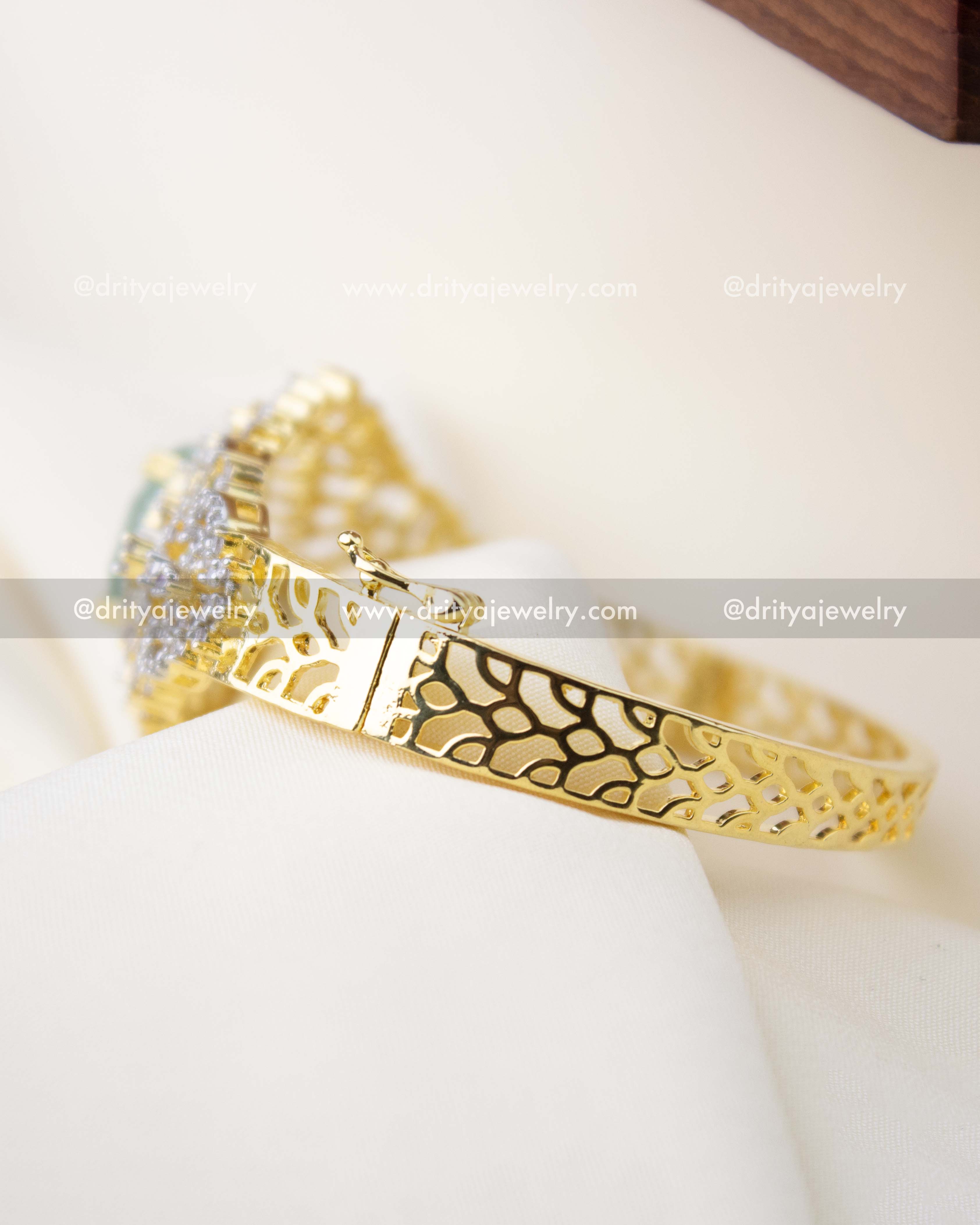 1295-MG side view of diamond replica kada with textured cutout design