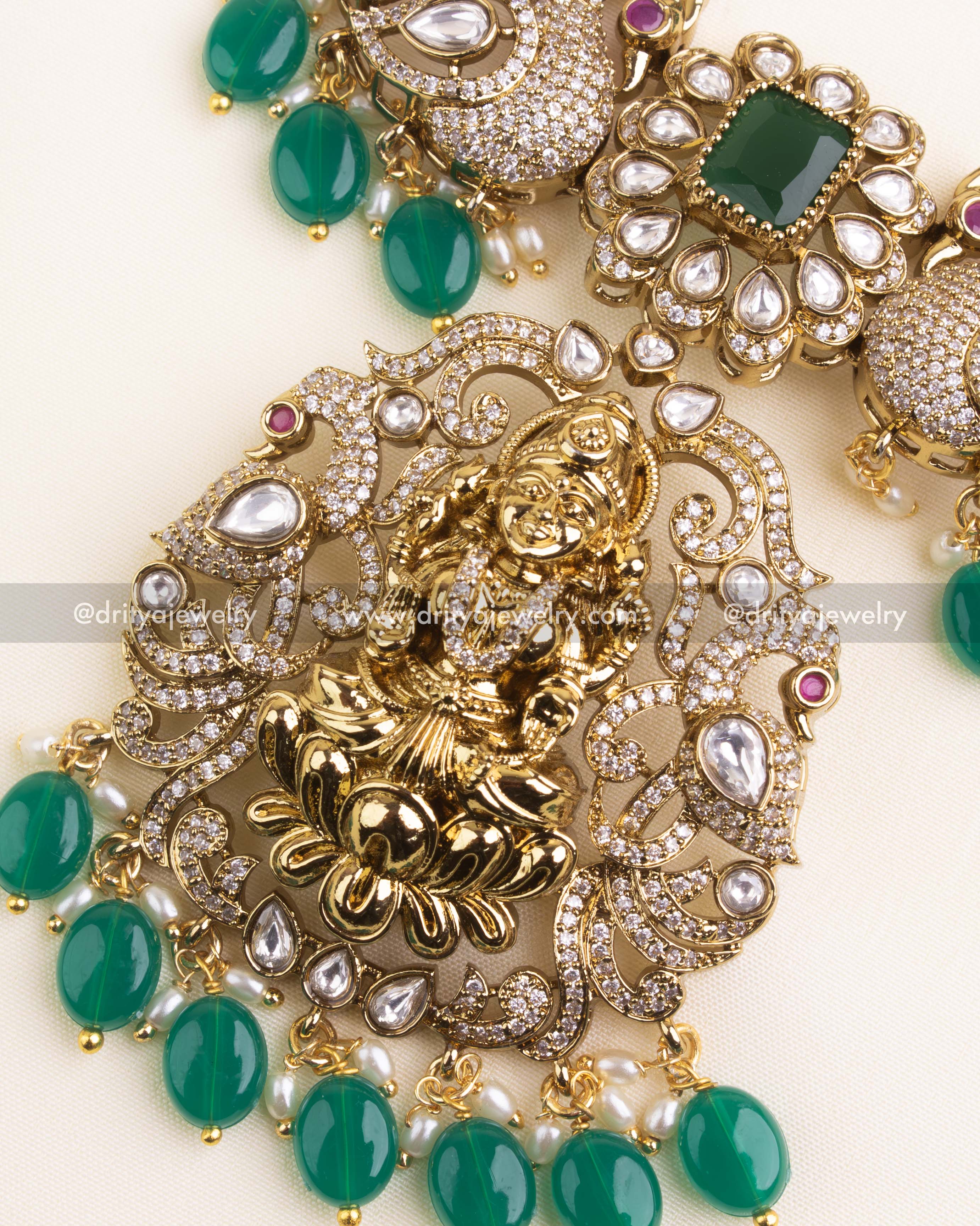 1157 Necklace Set close-up of central god idol pendant with emerald bead fringe