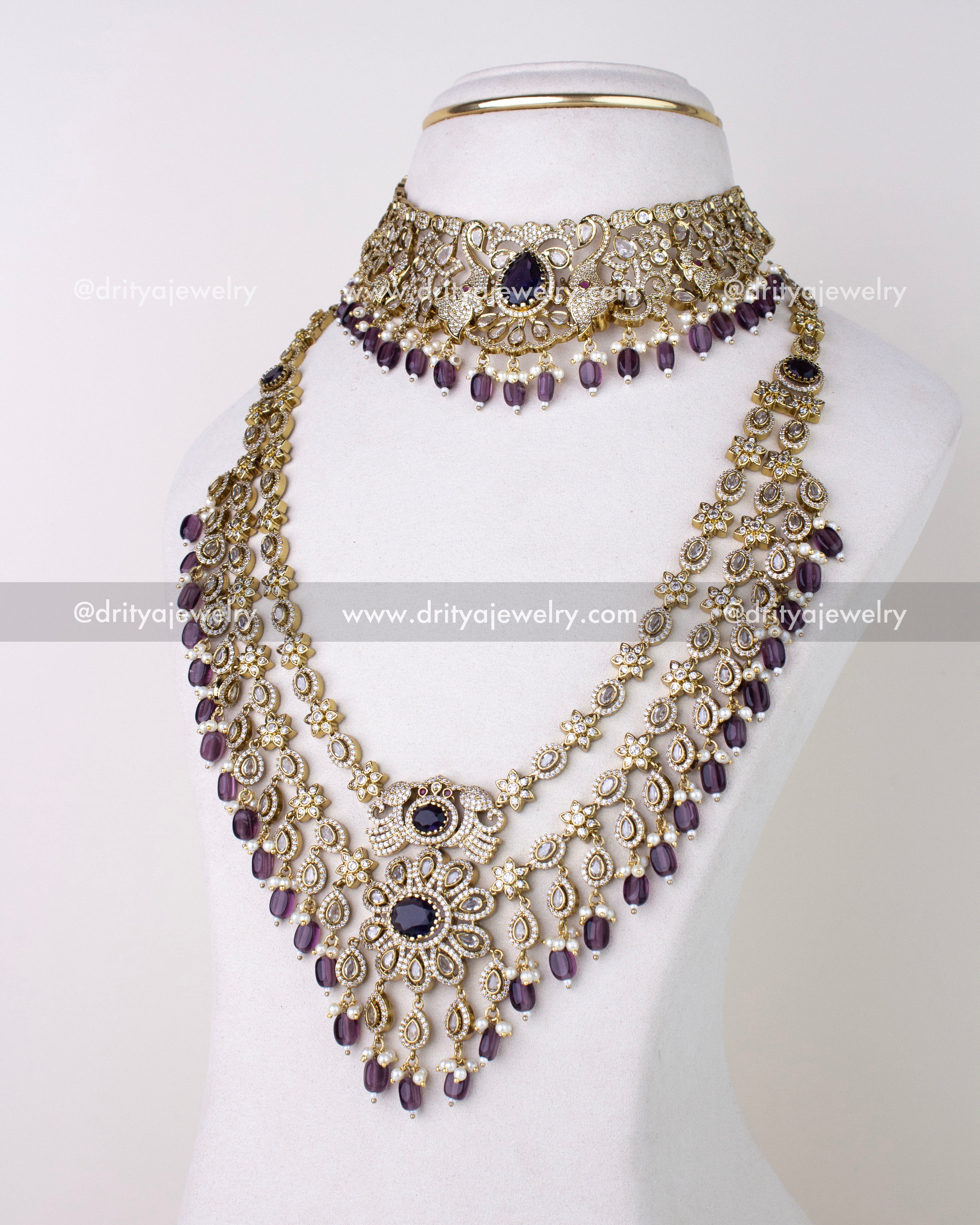 1309-PUSET full view of layered long necklace with matching choker on bust
