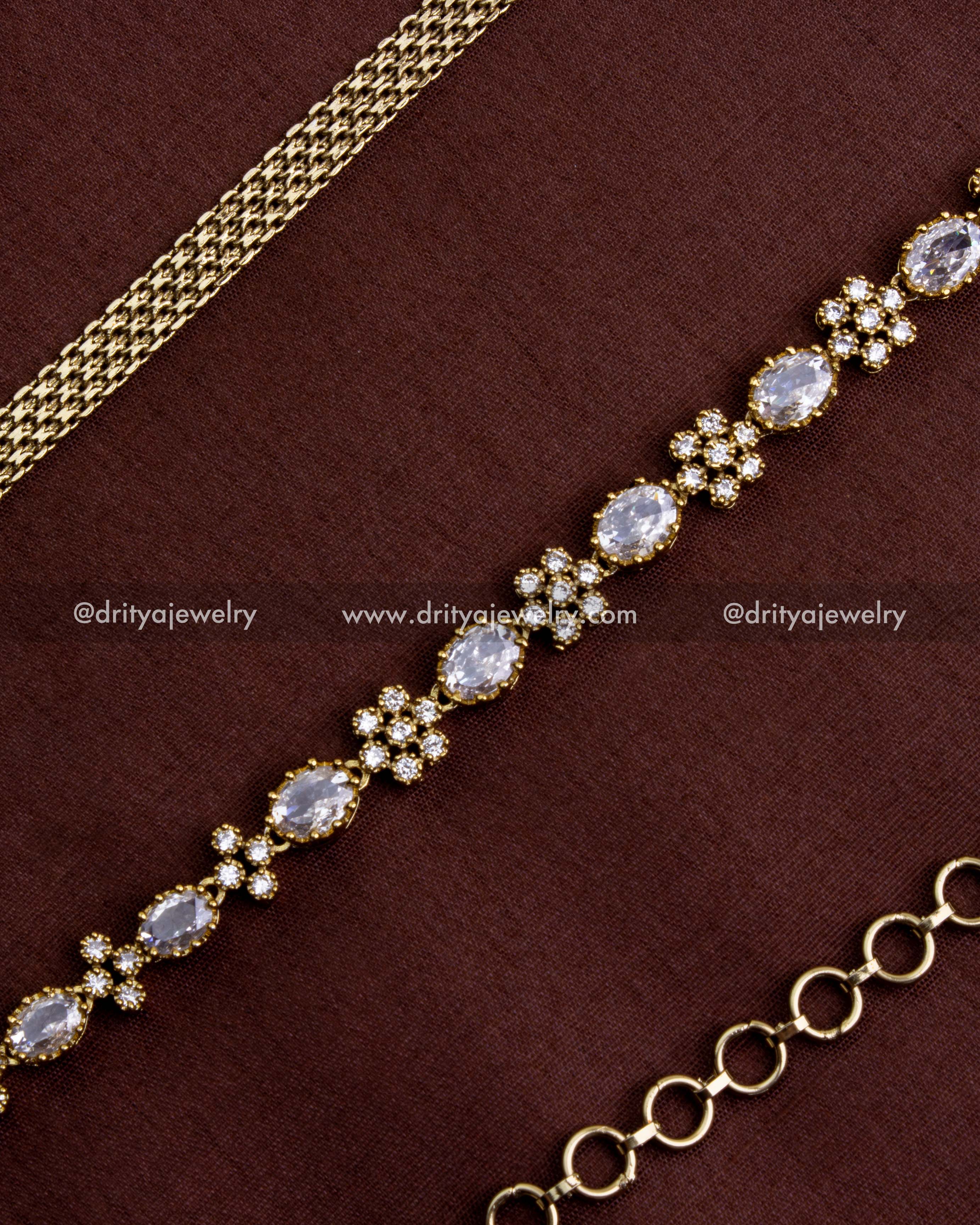 1109-R Victorian CZ hip chain close-up of floral and oval stone section