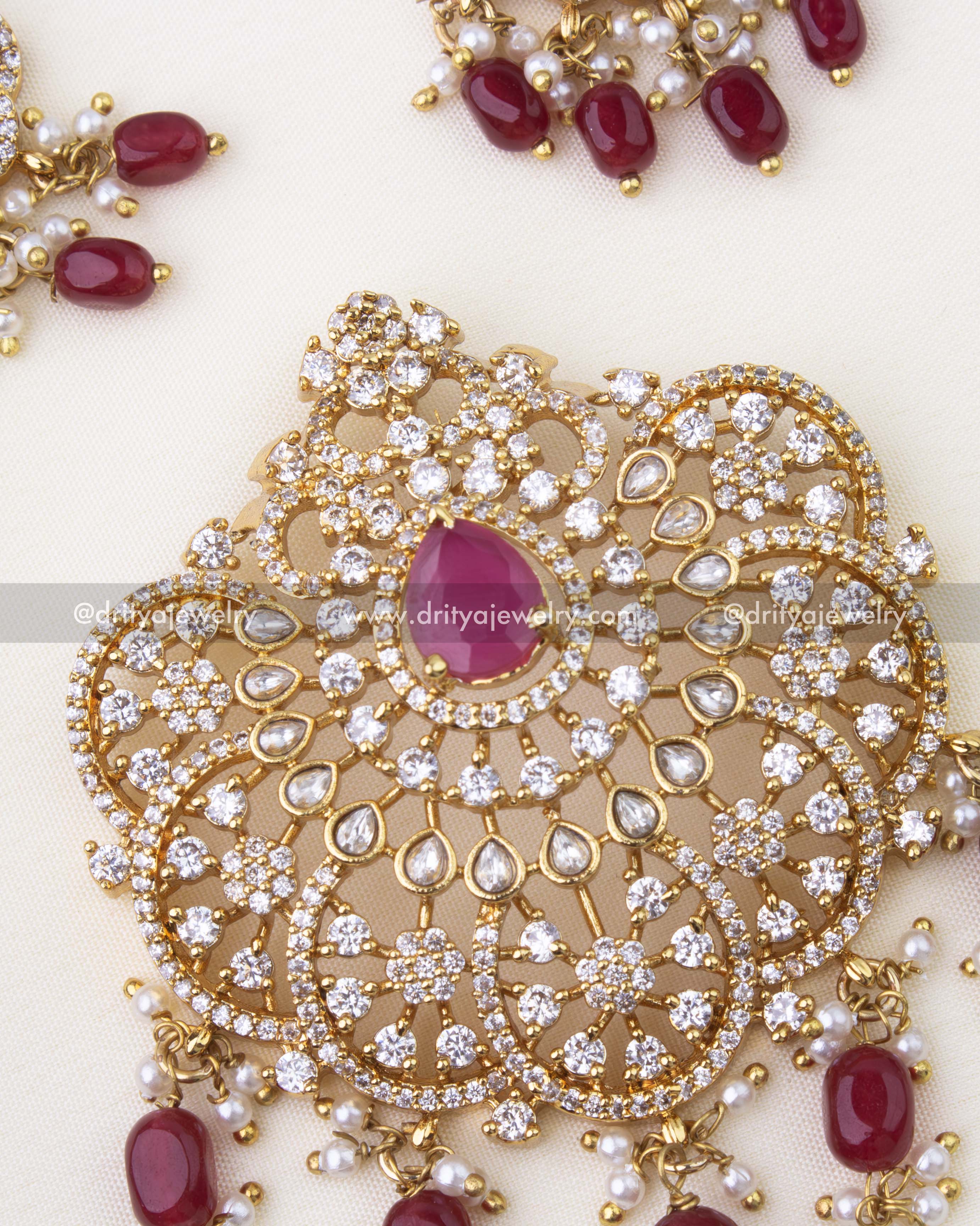 1269-R close-up of stone-studded pendant with red drops and pearls
