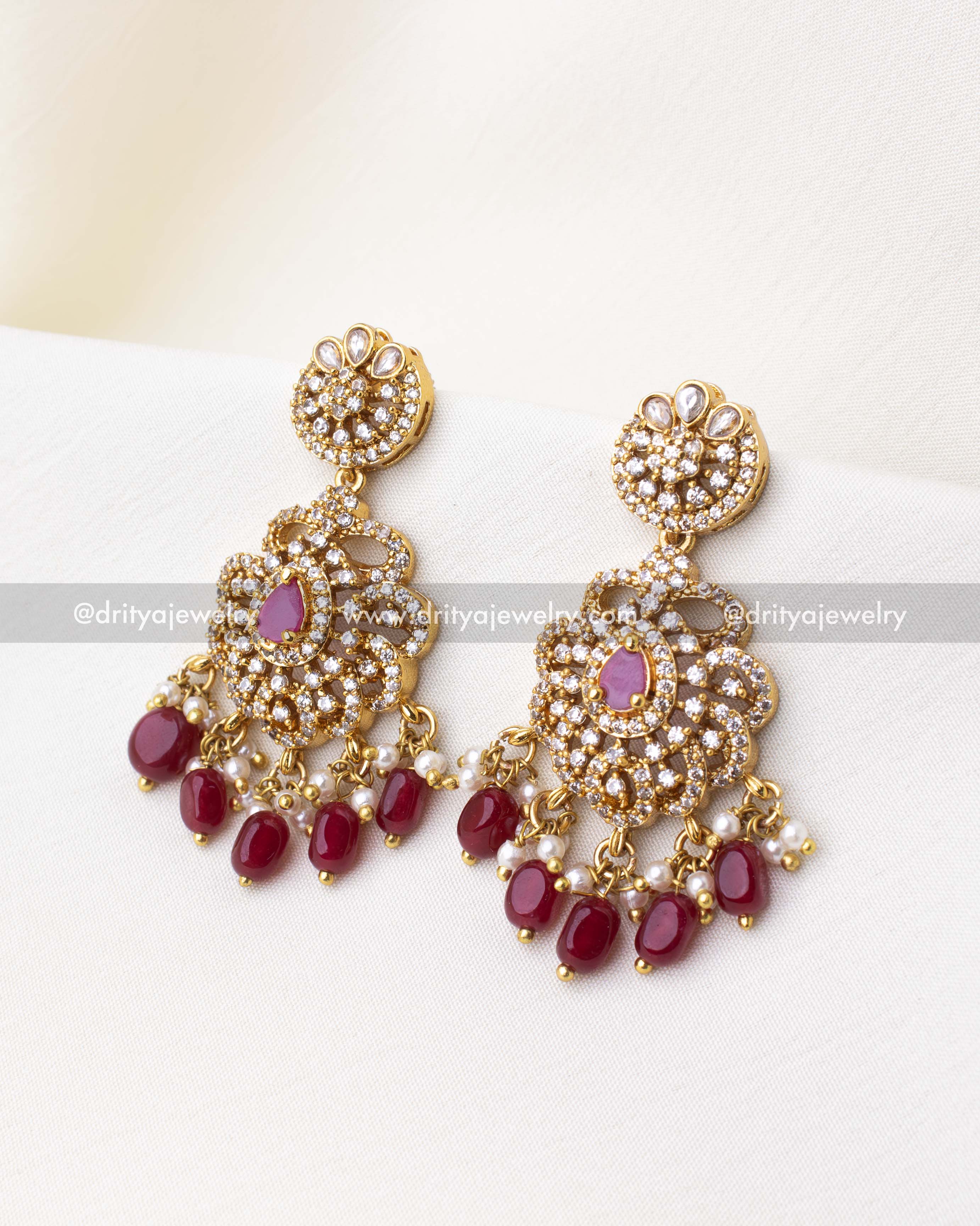 1269-R red stone gold finish dangler earrings front view